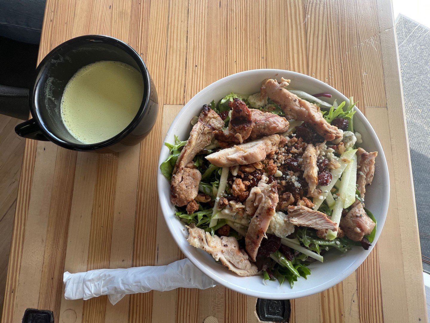 Fresh twist on a classic! 🥗. Tiny's Coffee Bar introduces the Michigan Salad with roasted chicken - mixed greens, juicy chicken, crispy apples, and tangy feta cheese, all tossed together with a delicious dressing and dried cherries. 

Stop by for a 