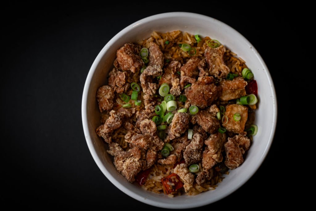 Kaarage fried chicken and ginger rice at Tinys restaurant in Gary Indiana