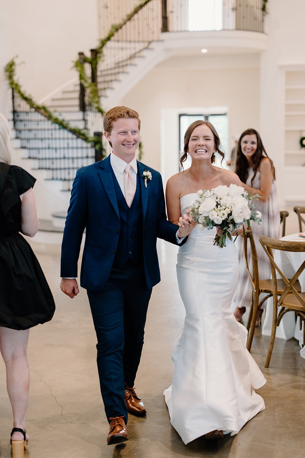 Abby and Ryan With Stairs and Garland.jpg