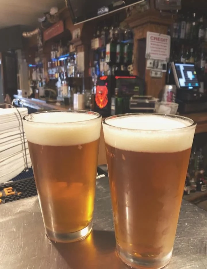 Photo of two glasses of Manny's on draft at the Sunset Cafe and Loose Wolf Saloon in Cle Elum, Washington.
