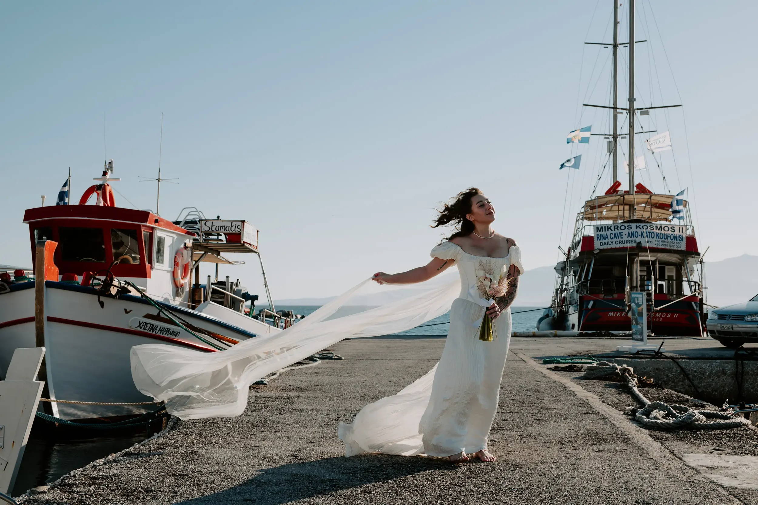 Elegant bridal portrait at Naxos Port in Greece, captured by Naxos Photographer Spyros Plakidas during a romantic island wedding photoshoot by the Aegean Sea.