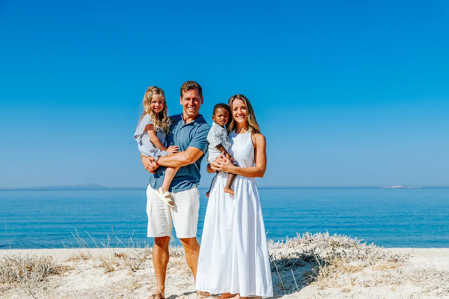 Family of four shot on the beach in Naxos during a morning session