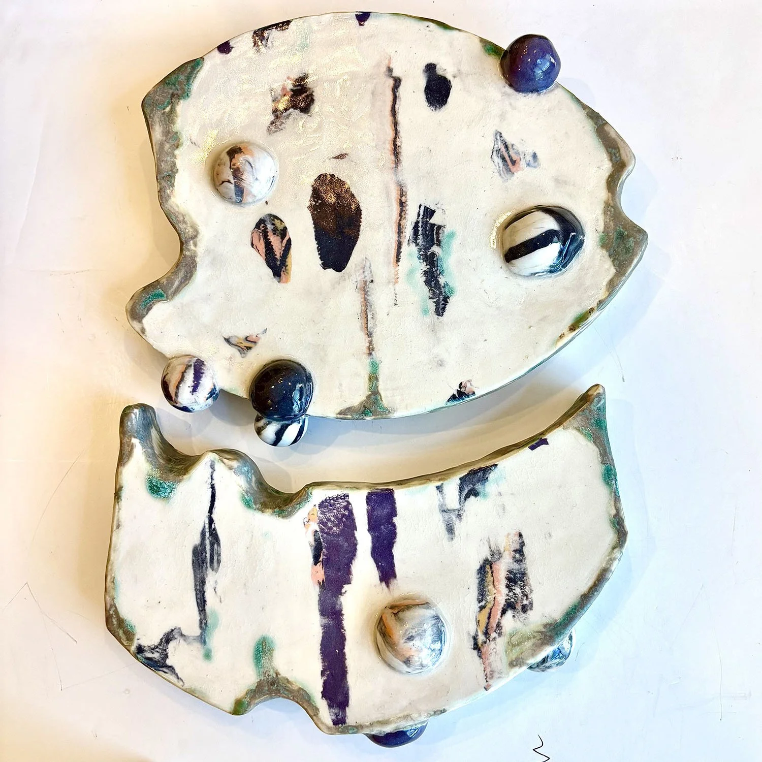 Go Bold,
created by Susan Hacker,
Ceramic wall sculpture,
14” x 11”,
$275