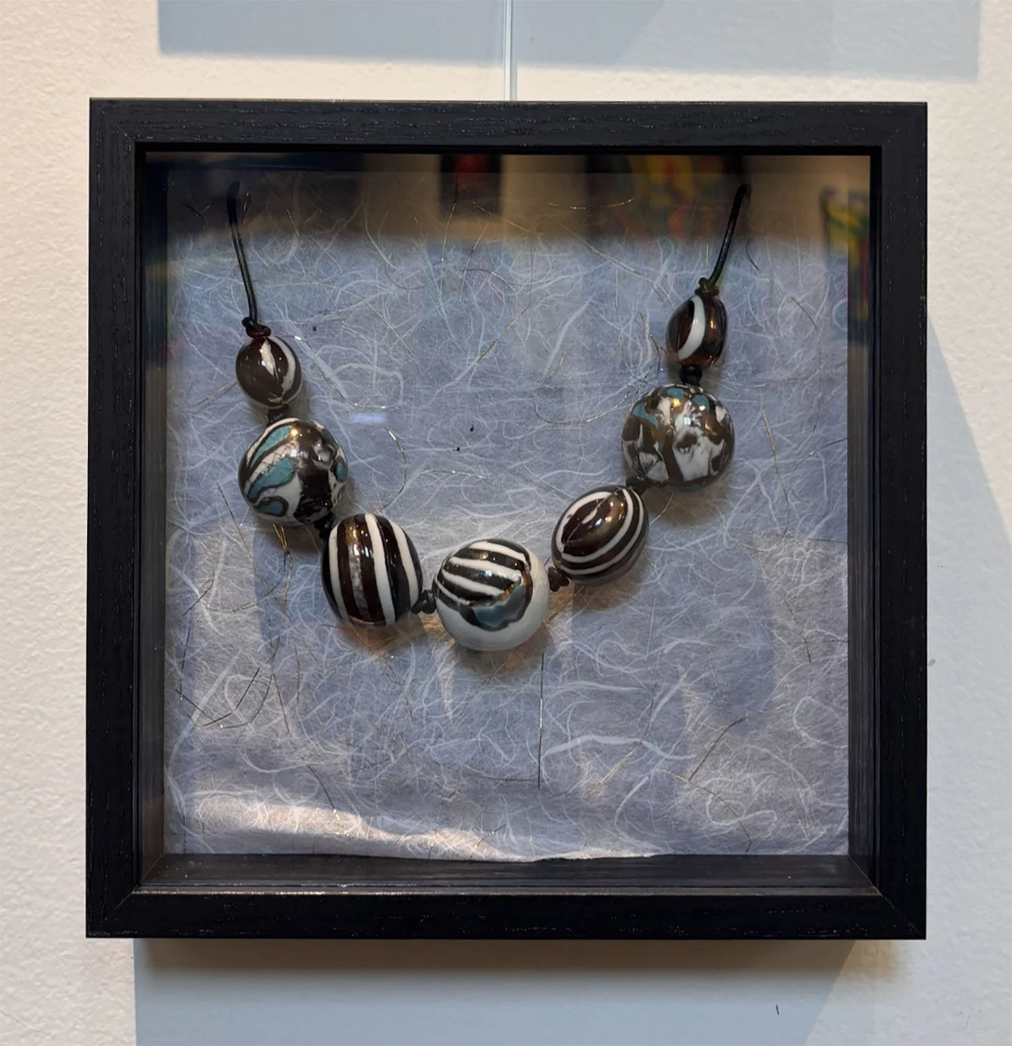 "Baby Take a Wow" by Susan Hacker.  Porcelain necklace.  $145.