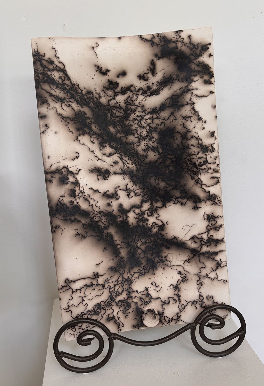 "Horsehair Platter" by Janet Cross of Babes of Mud & Fire.  Raku w/carbonized hair decoration.  Vintage stand.  $195 (stand included).