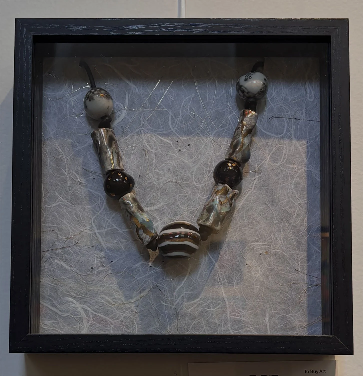 "Juniper" by Susan Hacker. Porcelain necklace.  $125.