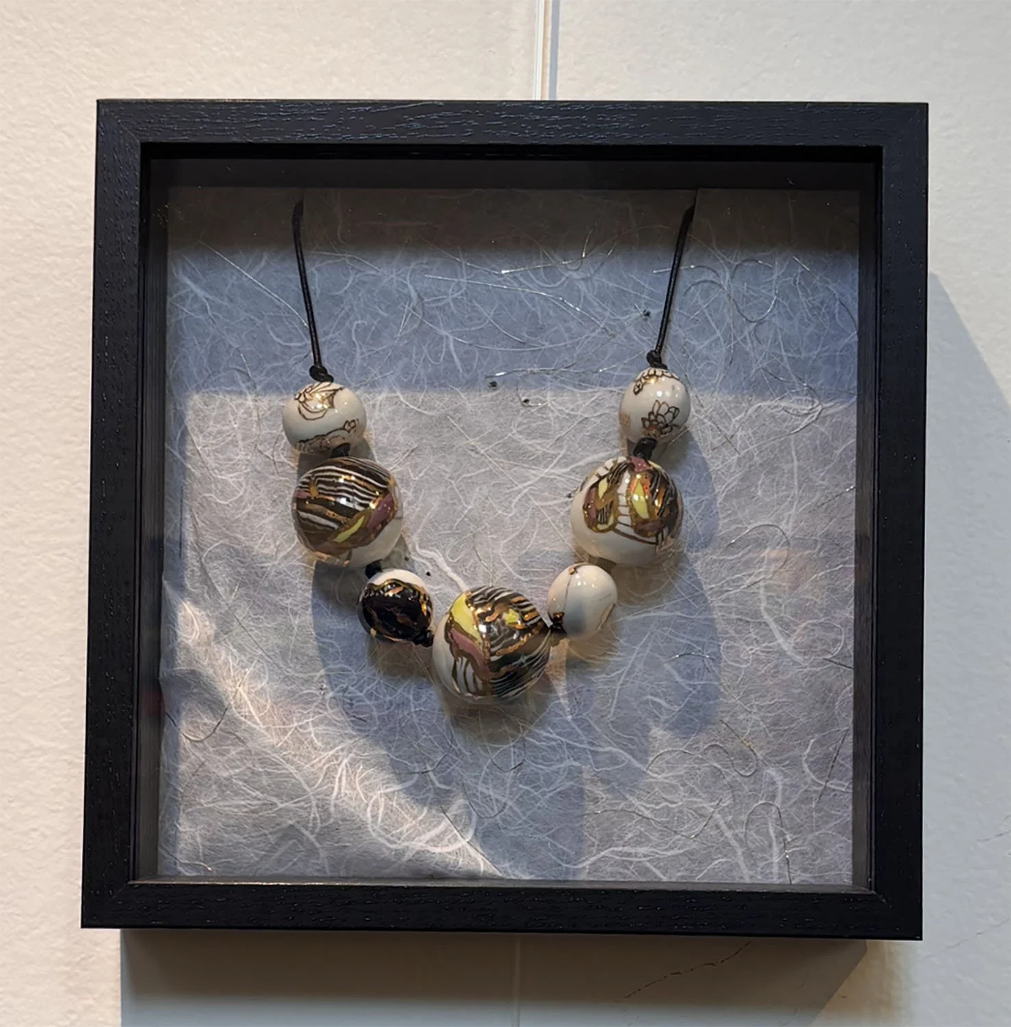 "Fan Dance" by Susan Hacker. Porcelain necklace.  $145.