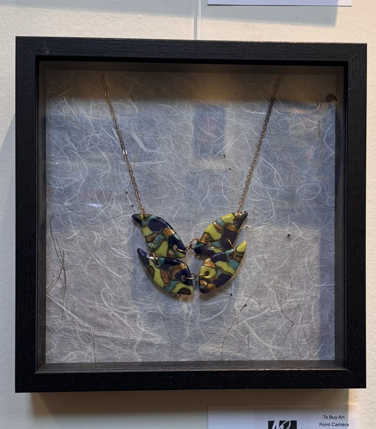 "Flyaway" by Susan Hacker. Porcelain necklace.  $155.