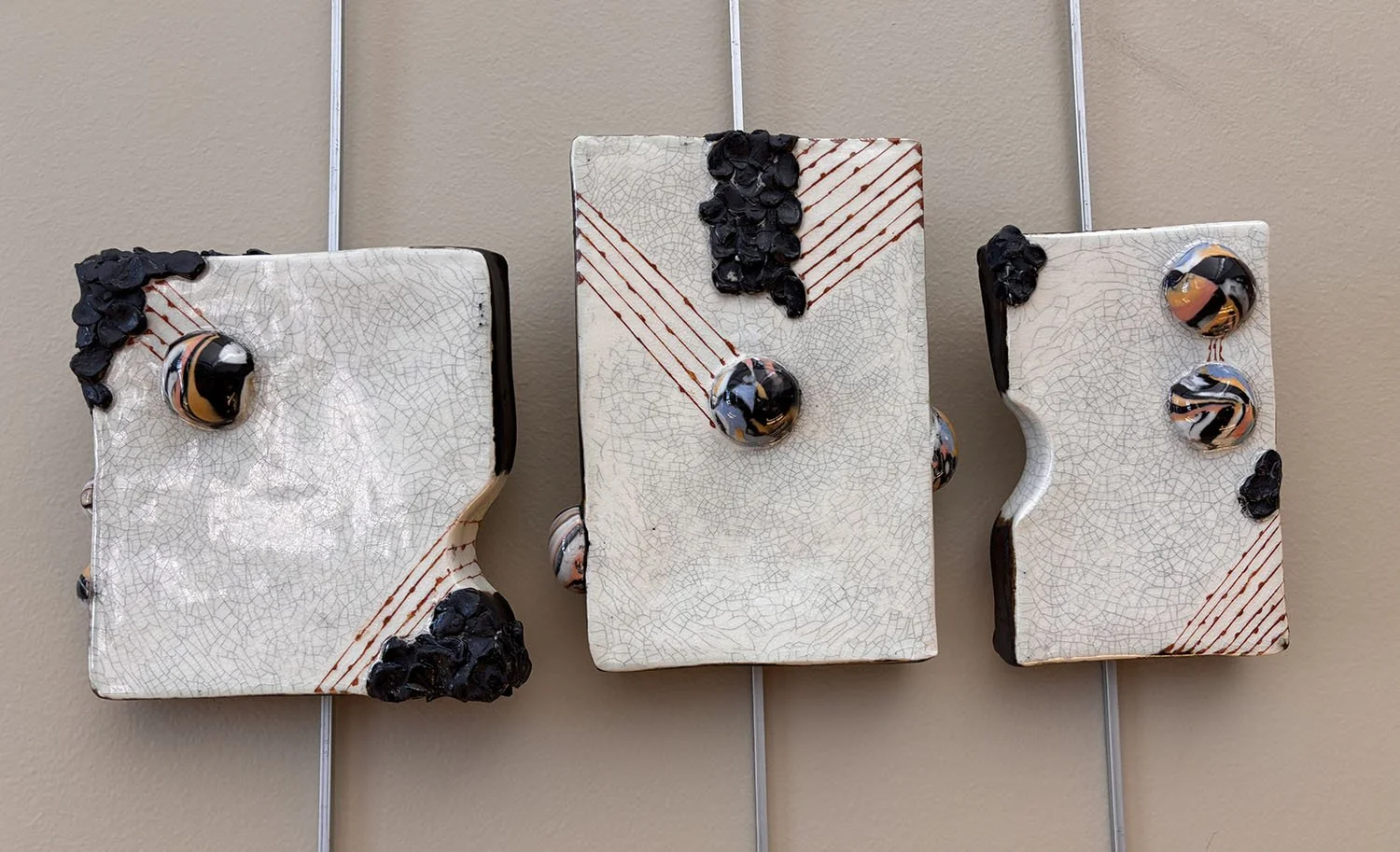 Interjamb,
created by Susan Hacker,
Three piece wall sculpture,
16” x 8”,
$345