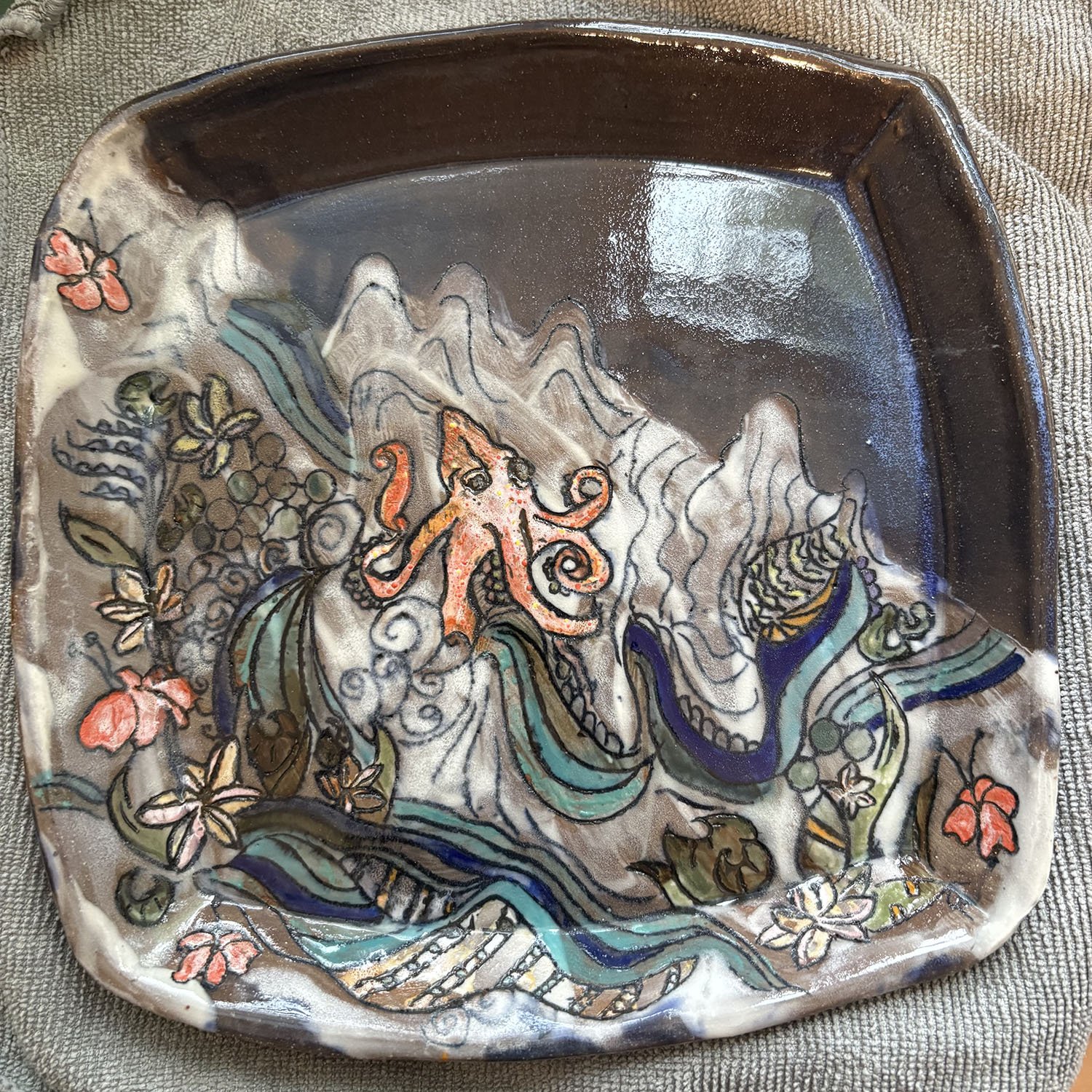 O-pie,
created by Susan Hacker,
Ceramic plate,
9” x 9”,
$ 95.00