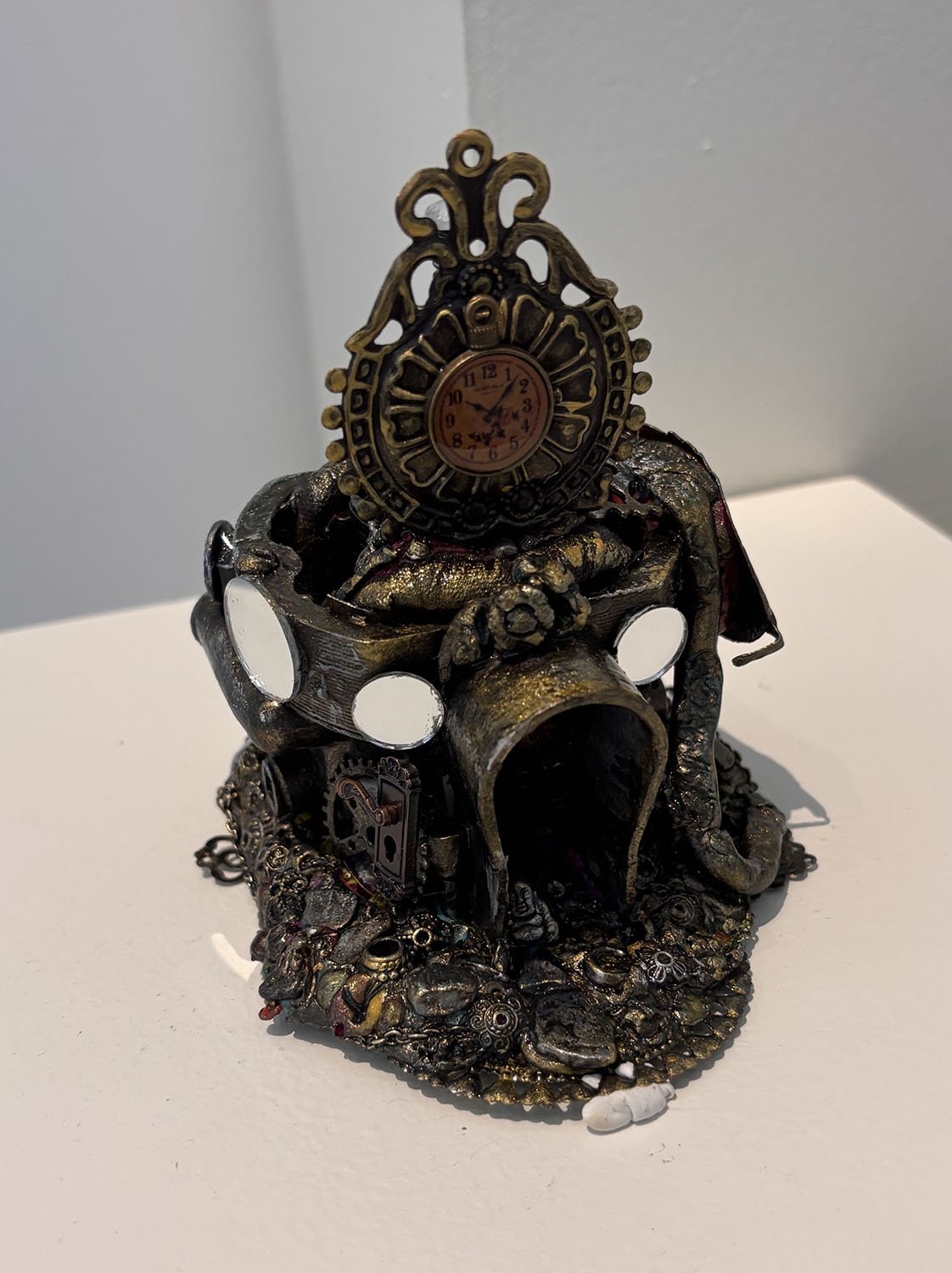 "Best Forest Inn – Only Friendly Creatures Allowed" by Susan Orosz.  Polymer clay, 
5” x 6”.  $75. 