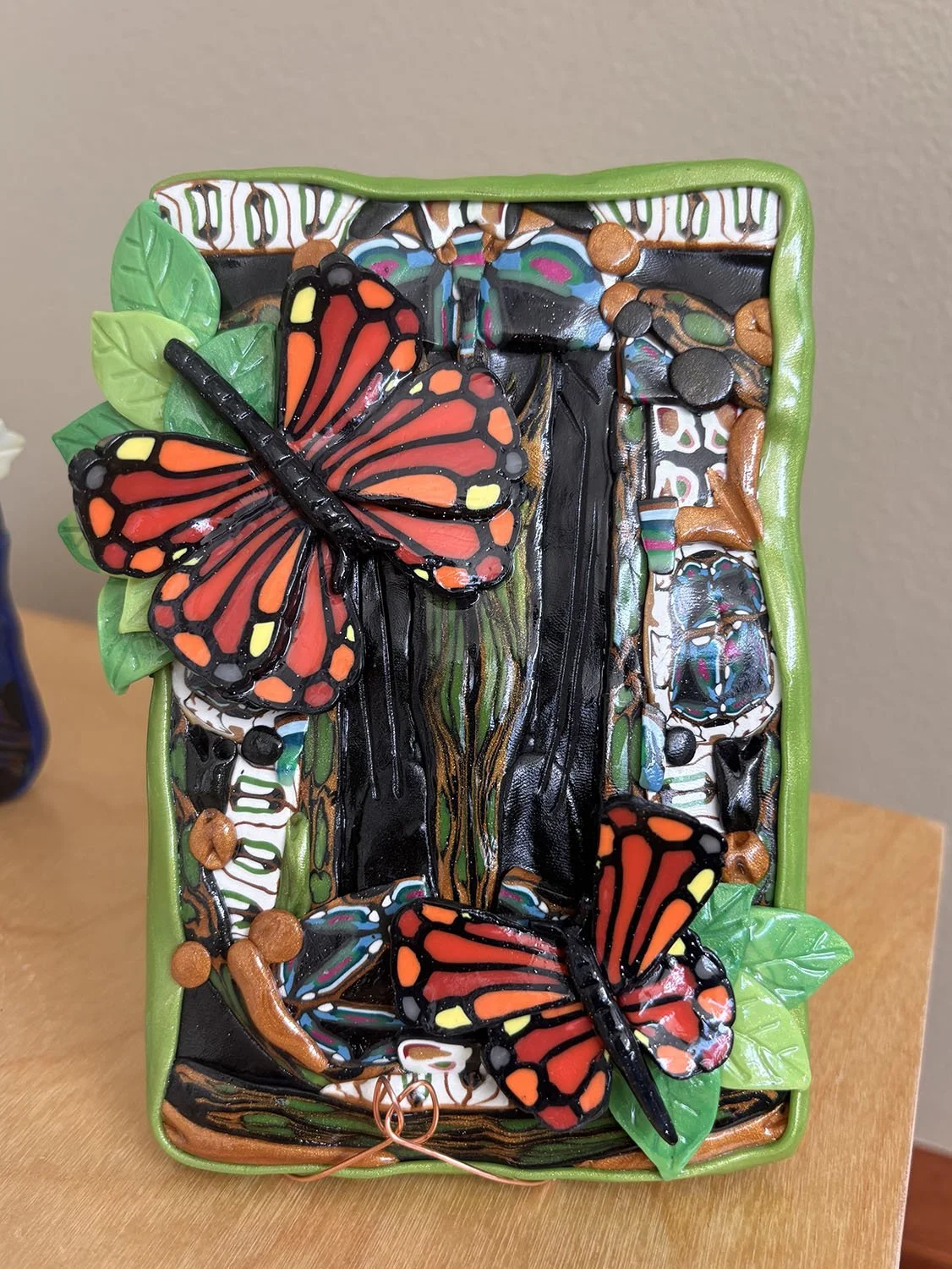 Butterfly Window Number 28,
Marina Lostetter.
Polymer Clay Tin and Paper,
5.5” x 4.5”,



$50.
