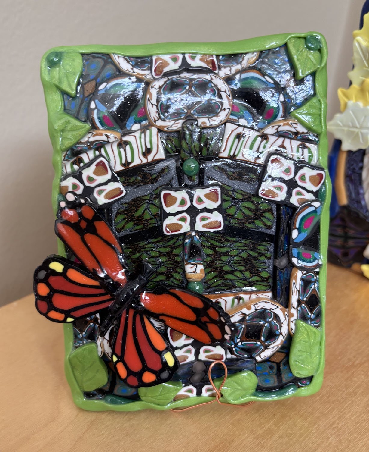 Butterfly Window Number 26,
Marina Lostetter.
Polymer Clay Tin and Paper,
5” x 3.5”,



$40.
