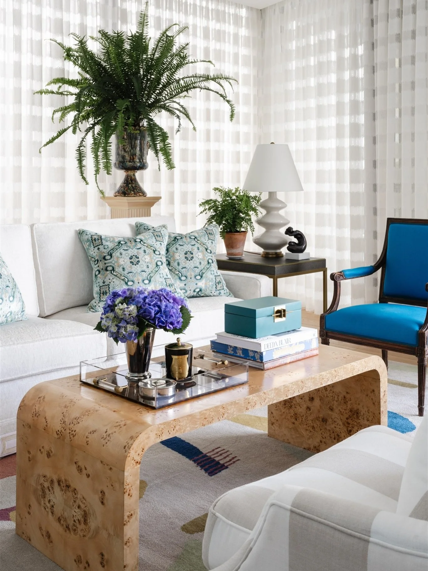 The living room from a recently completed project at New Farm. I kept the main upholstered pieces neutral and elegant, and added pattern and interest through the fabulously bonkers custom-made rug I designed.

I&rsquo;ve always loved the addition of 