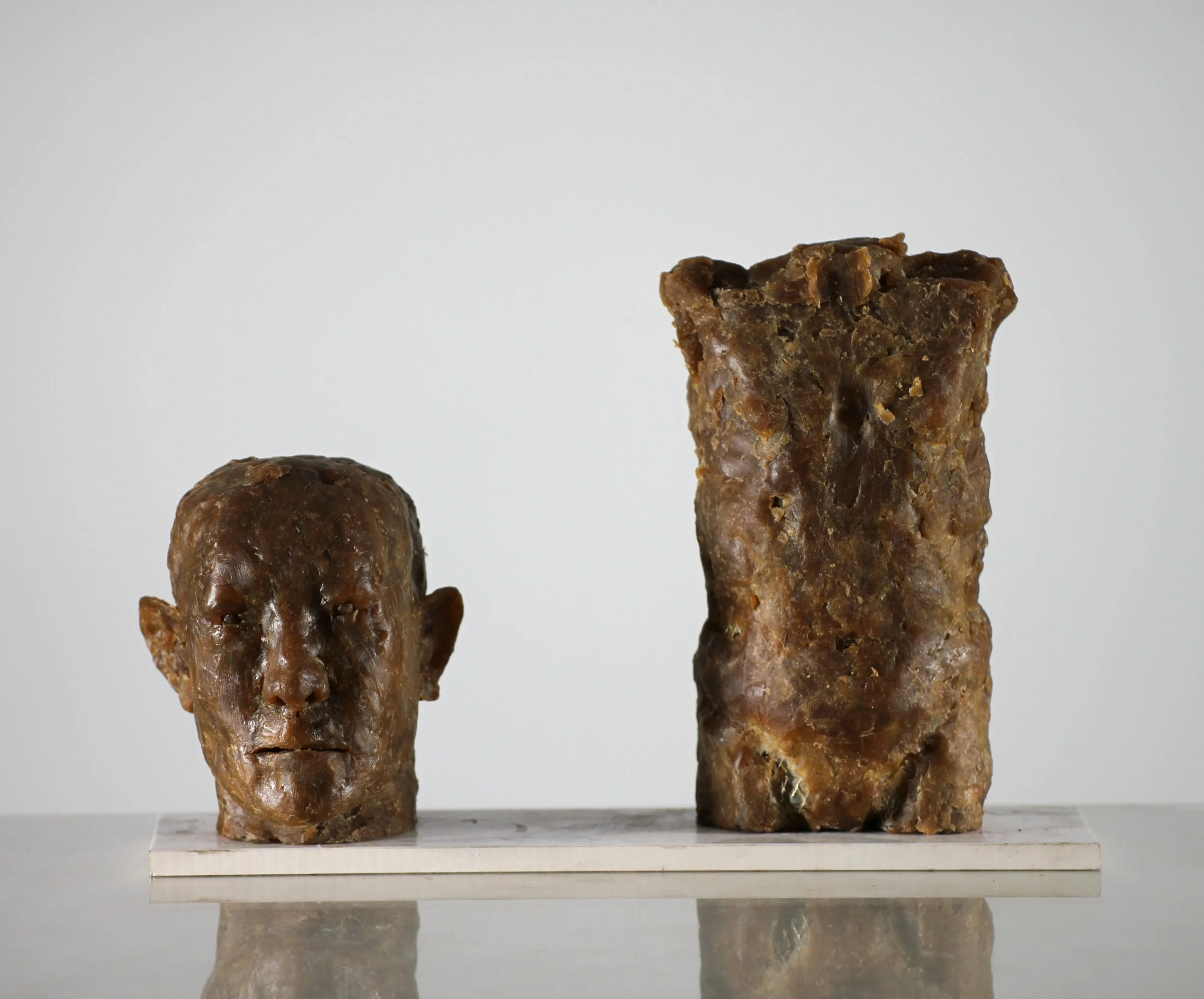 Head, Torso (2023), microcrystalline wax, 8 x 13 x 4 1/2 inches