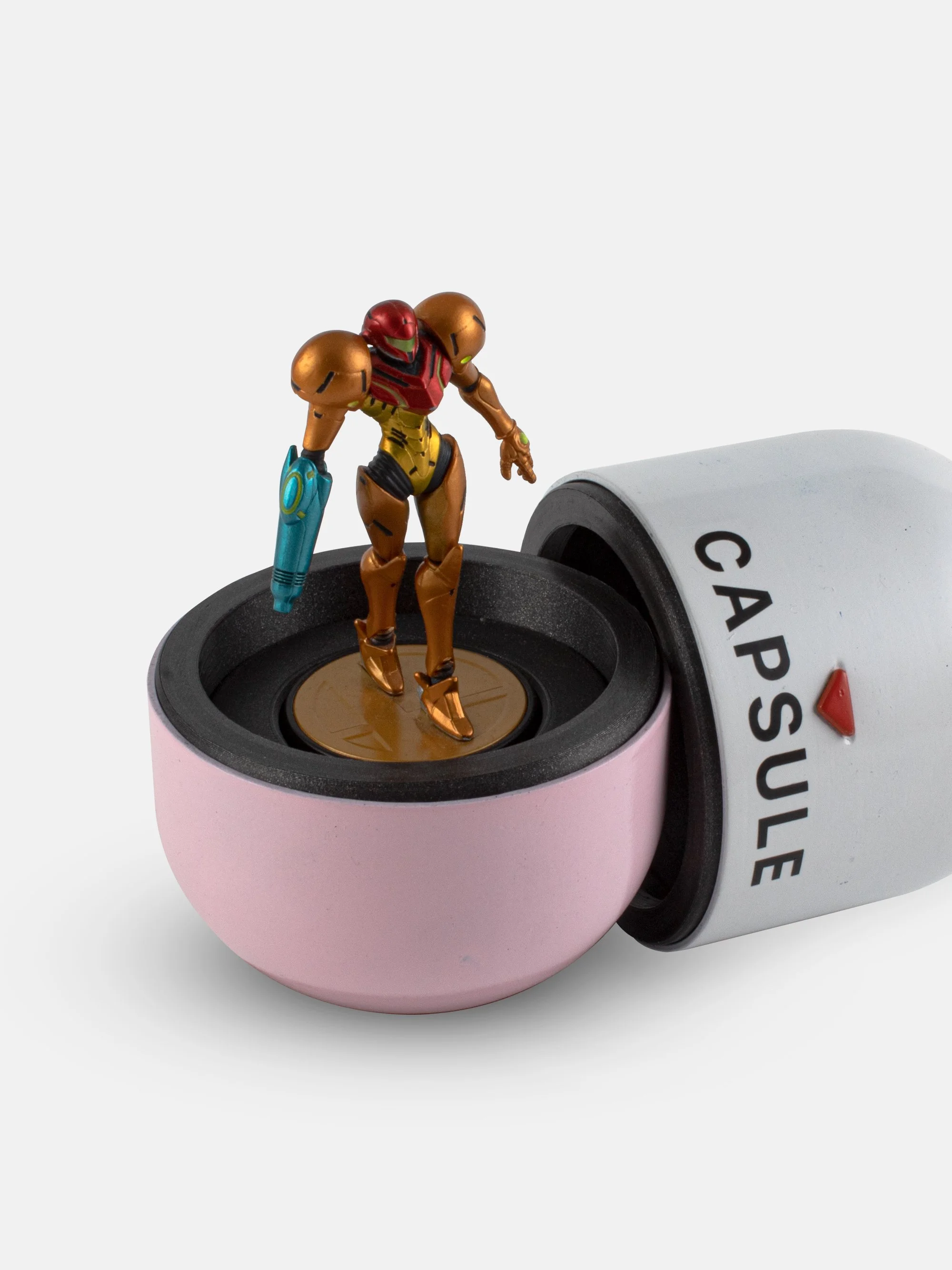 3D printed super smash brothers capsule with Samus amiibo inside