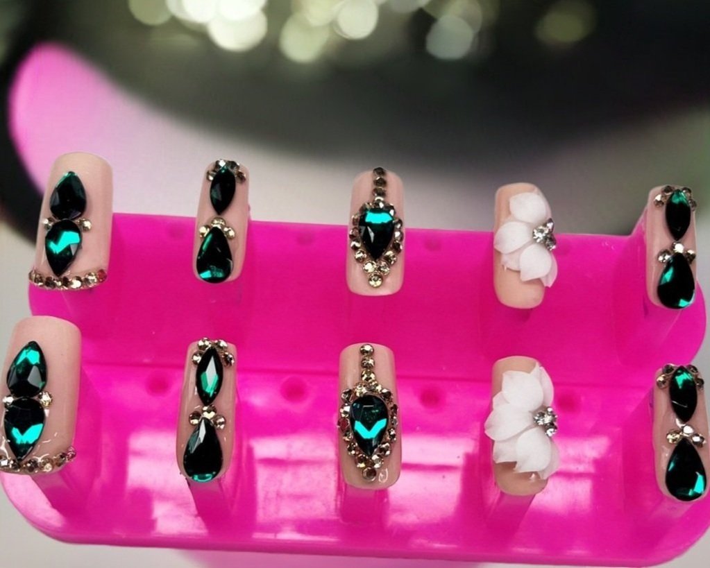 Emerald City luxury press-on nails with nude, gems, and 3D flower design