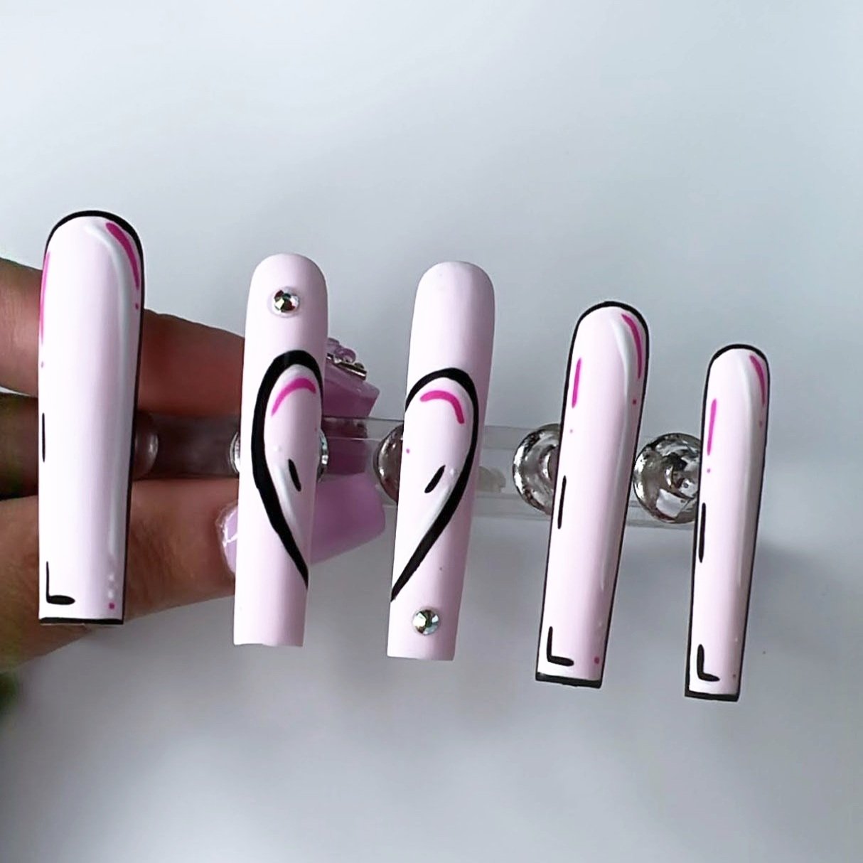 Pink comic art press-on nails, reusable, pop art style. Marissa's Nail Room custom nail design