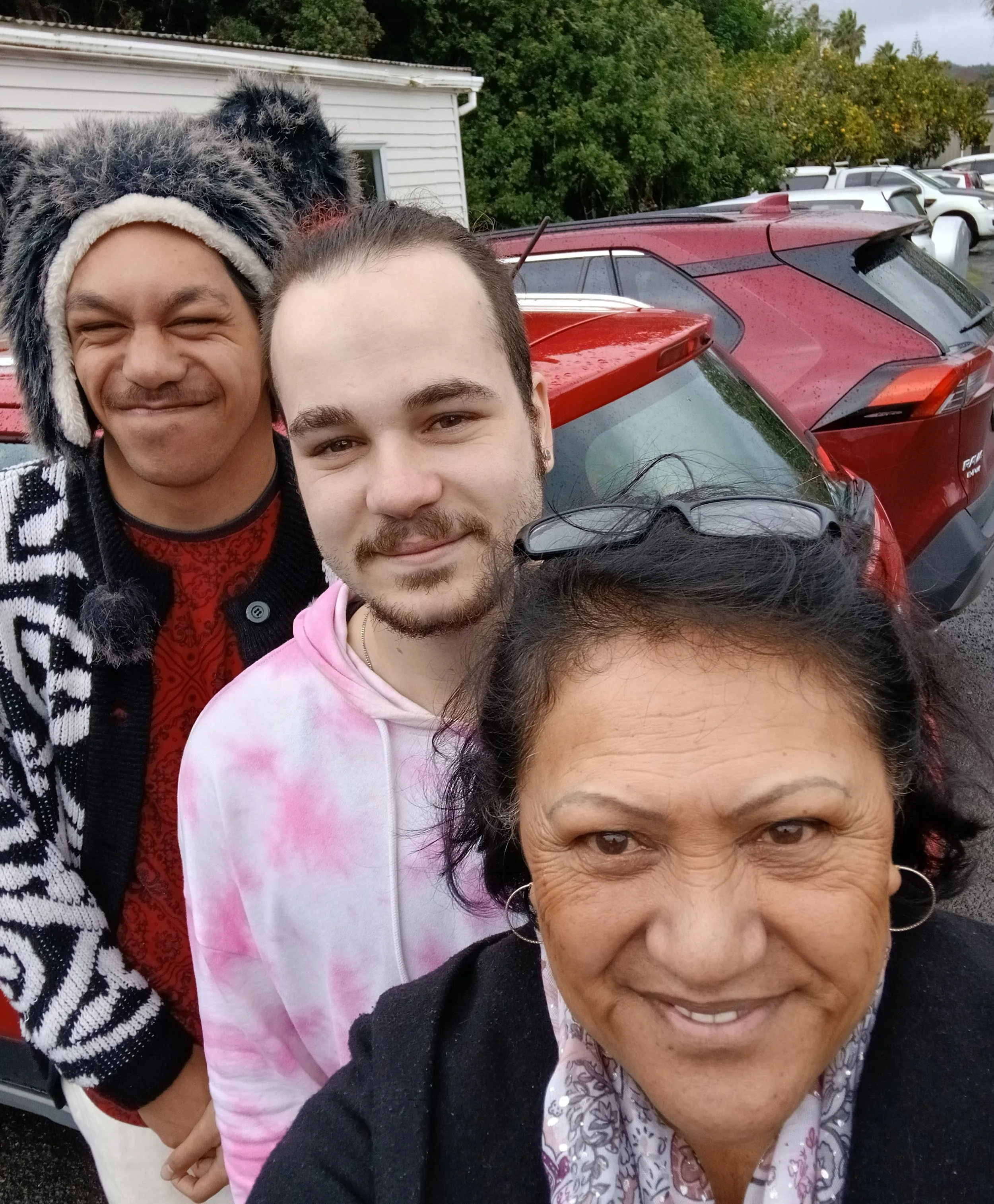 Selfie taken by Jo of herself, Rus and Shannon, smiling.