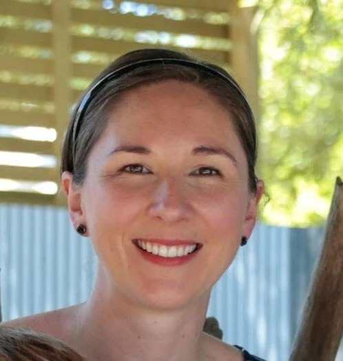 Headshot of Carmen Curtis, smiling.