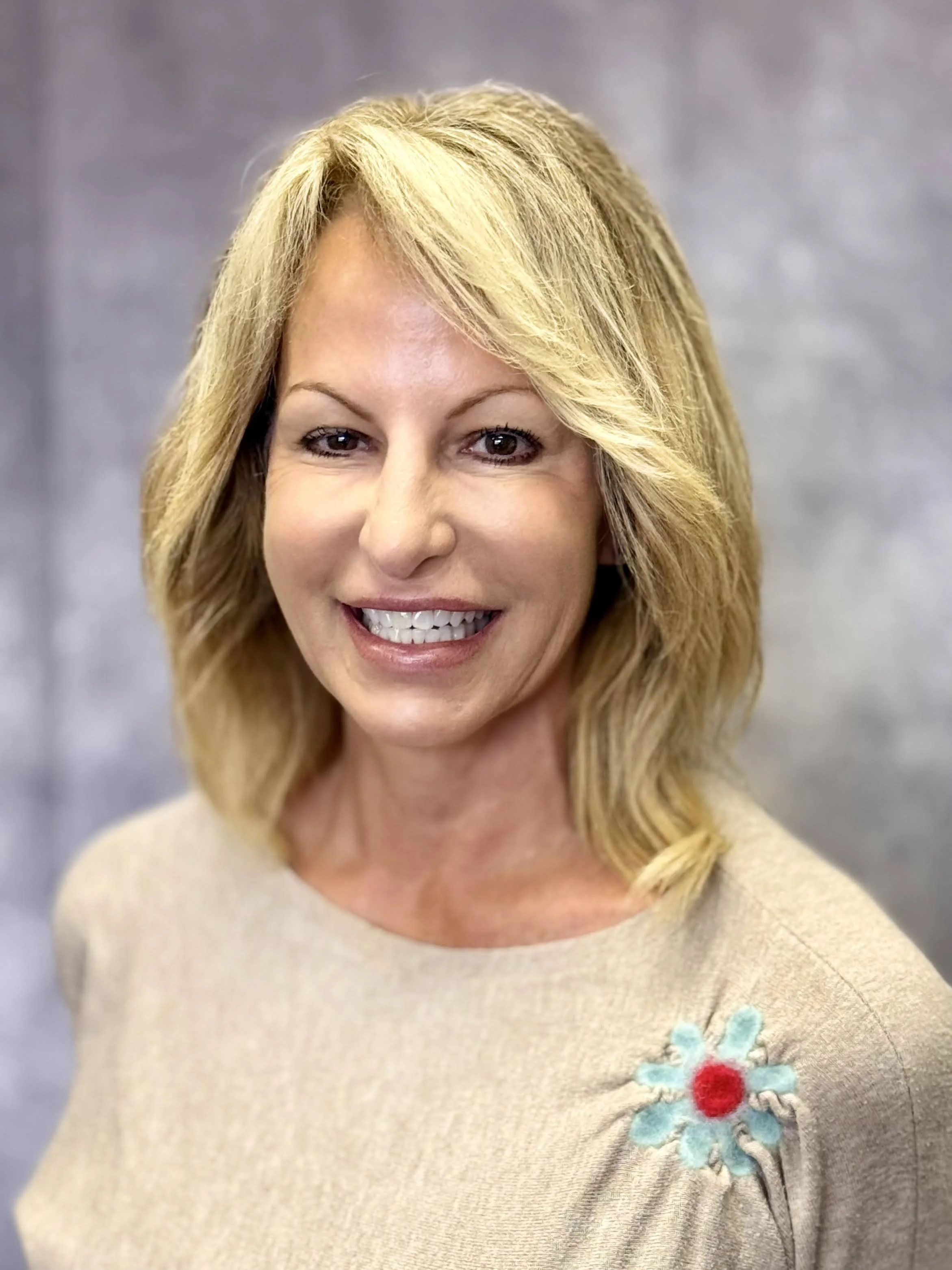 Ms. Deborah Farina
