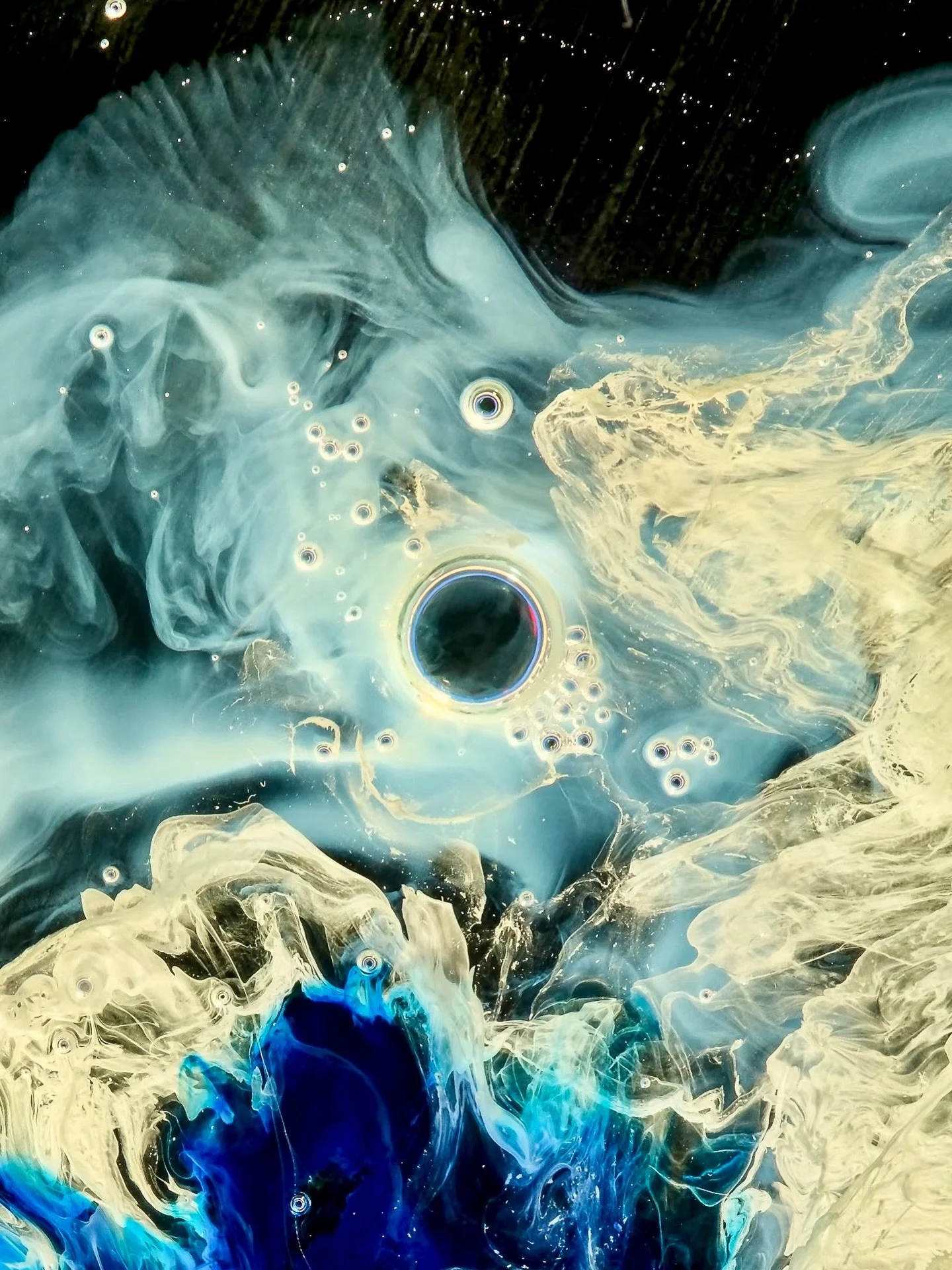 A selection of still frames from my recent recordings made using my aquarium setup. These images come from experiments with different liquids and substances interacting in a small-scale environment, captured with a macro camera at around 15 mm.

Each