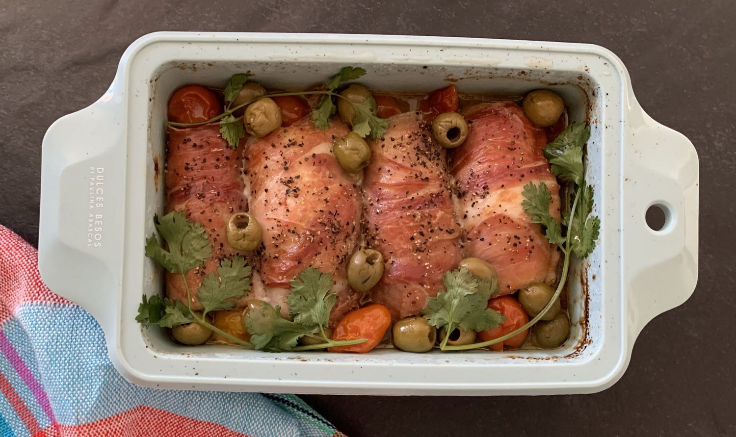 Cod Wrapped in Parma Ham with Cherry Tomato and Olive Traybake