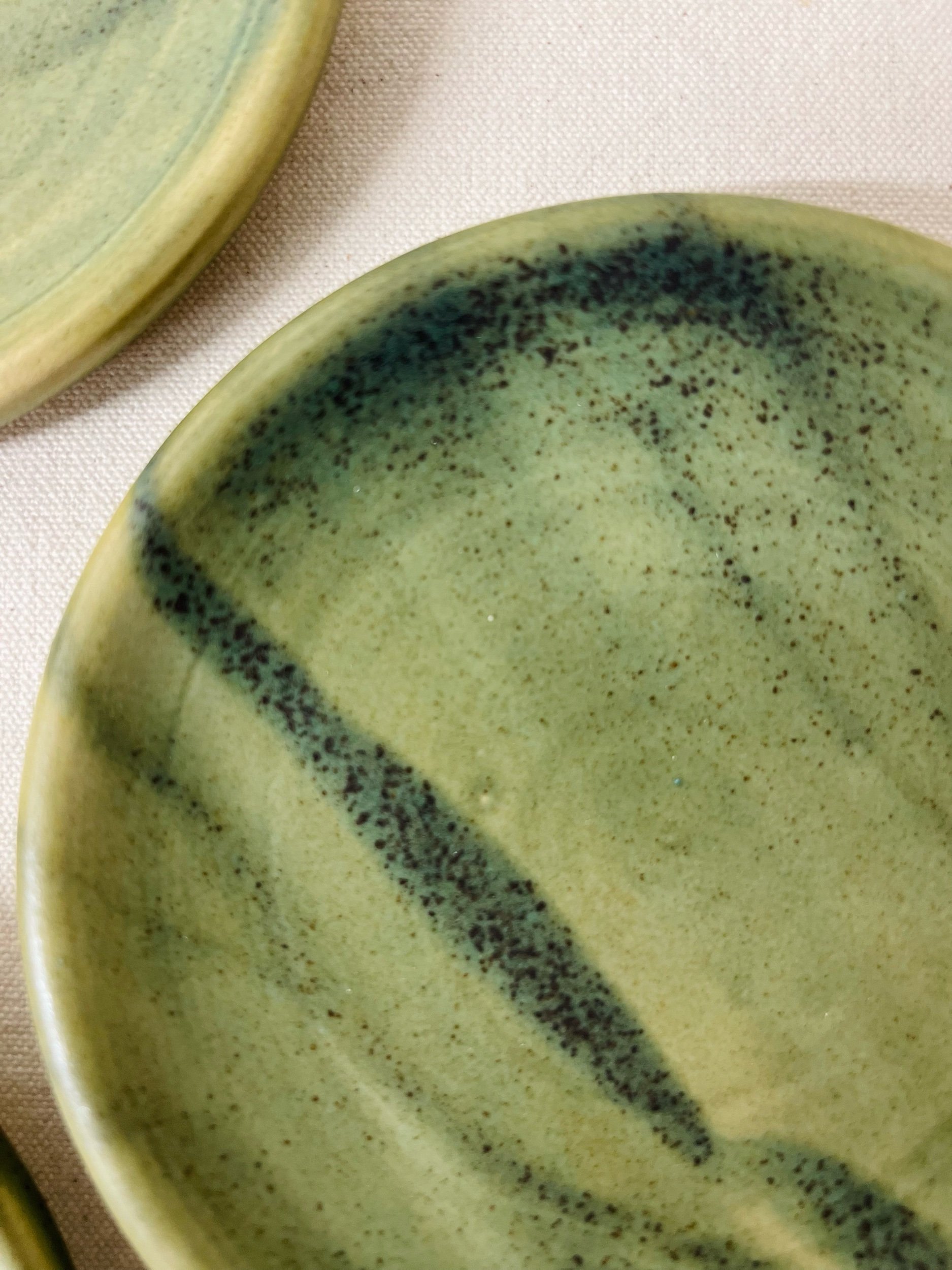 Green ceramic handmade spoon rest, made in Glasgow, Scotland. Modern rustic pottery. Contemporary handmade ceramics. Pottery inspired by nature.
