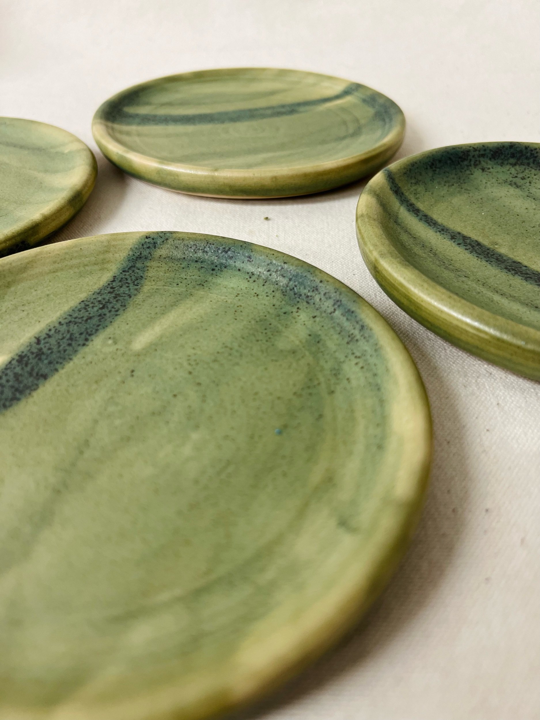 Green ceramic handmade spoon rest, made in Glasgow, Scotland. Modern rustic pottery. Contemporary handmade ceramics. Pottery inspired by nature.