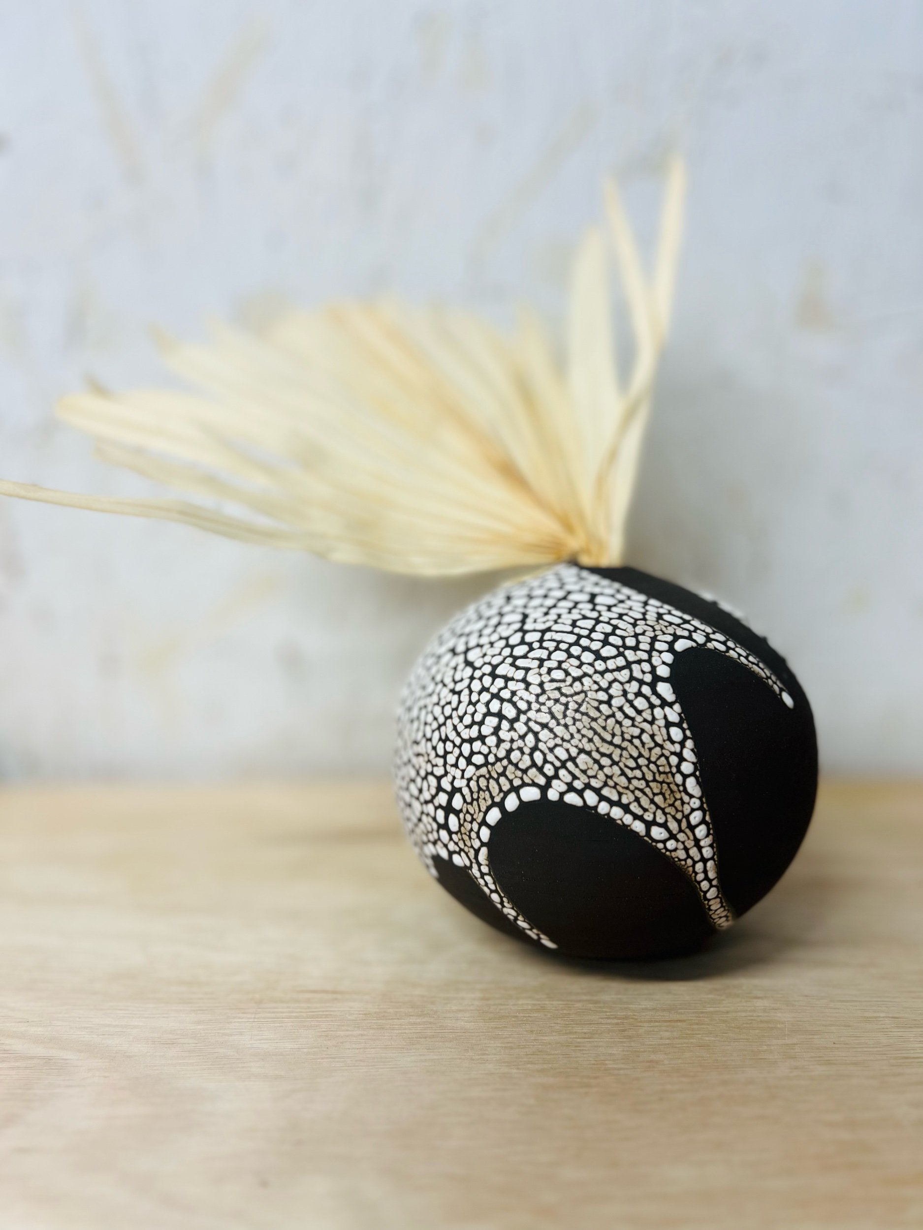 Small, handmade ceramic bud vase made with black stoneware. Made in Scotland. Handmade rustic stoneware vase made in Glasgow. Home decor inspired by nature. unique handmade vases. Handmade gifts.