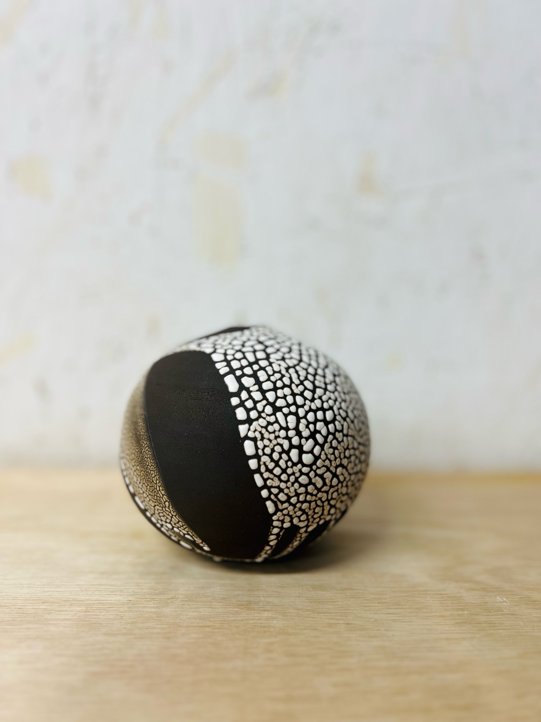 Small, handmade ceramic bud vase made with black stoneware. Made in Scotland. Handmade rustic stoneware vase made in Glasgow. Home decor inspired by nature. unique handmade vases. Handmade gifts.