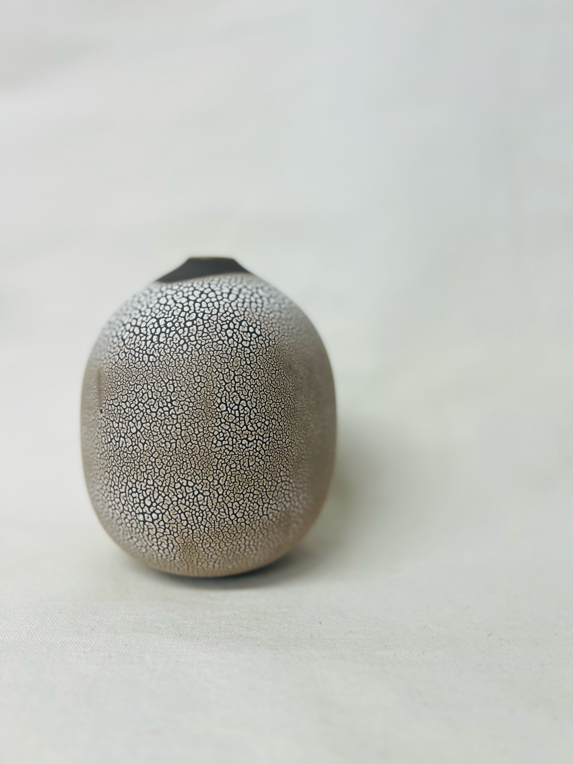 handmade ceramic vase made with black stoneware. Made in Scotland. Handmade rustic stoneware vase made in Glasgow. Home decor inspired by nature. unique handmade vases. Handmade gifts.