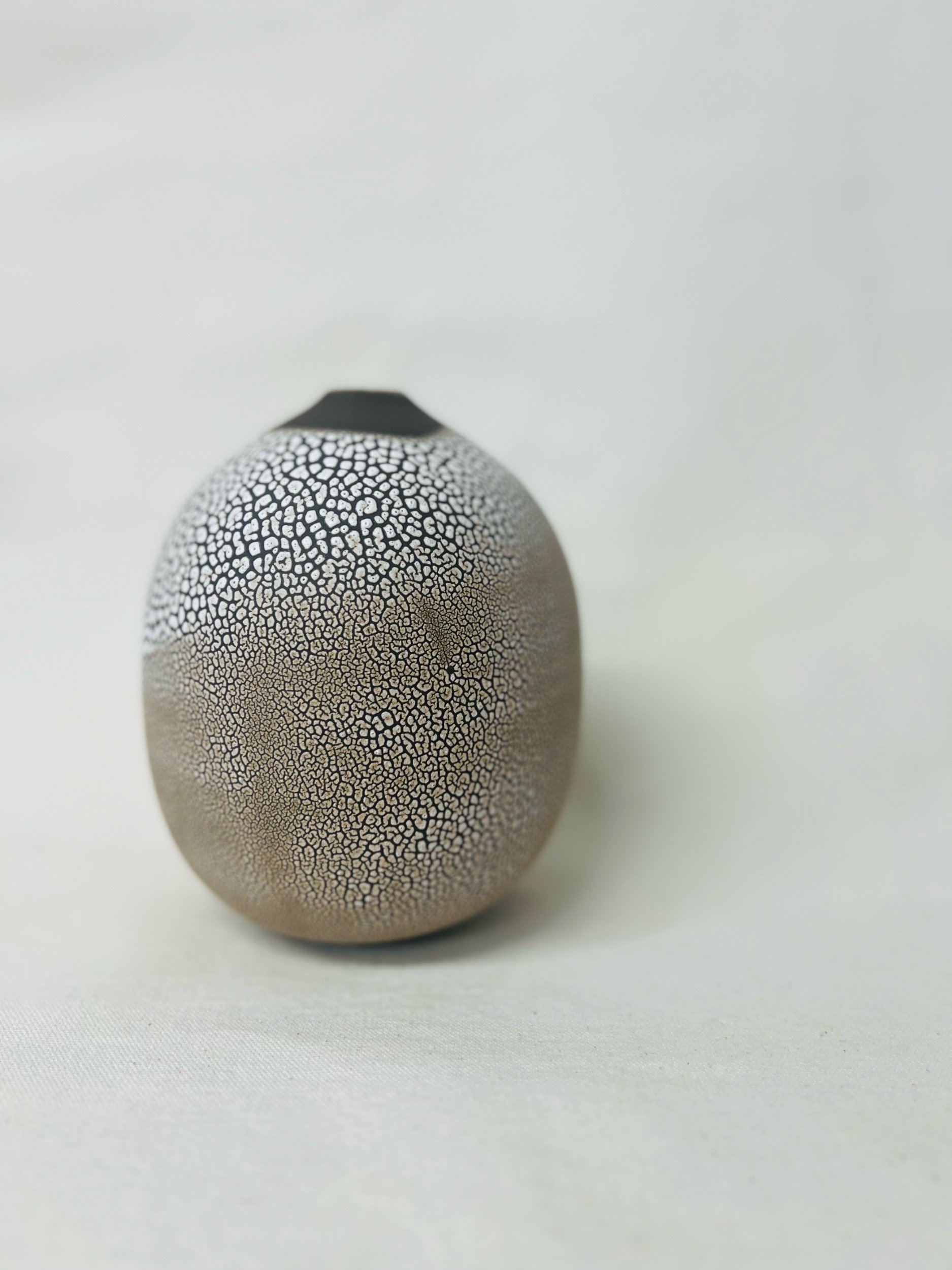 handmade ceramic vase made with black stoneware. Made in Scotland. Handmade rustic stoneware vase made in Glasgow. Home decor inspired by nature. unique handmade vases. Handmade gifts.