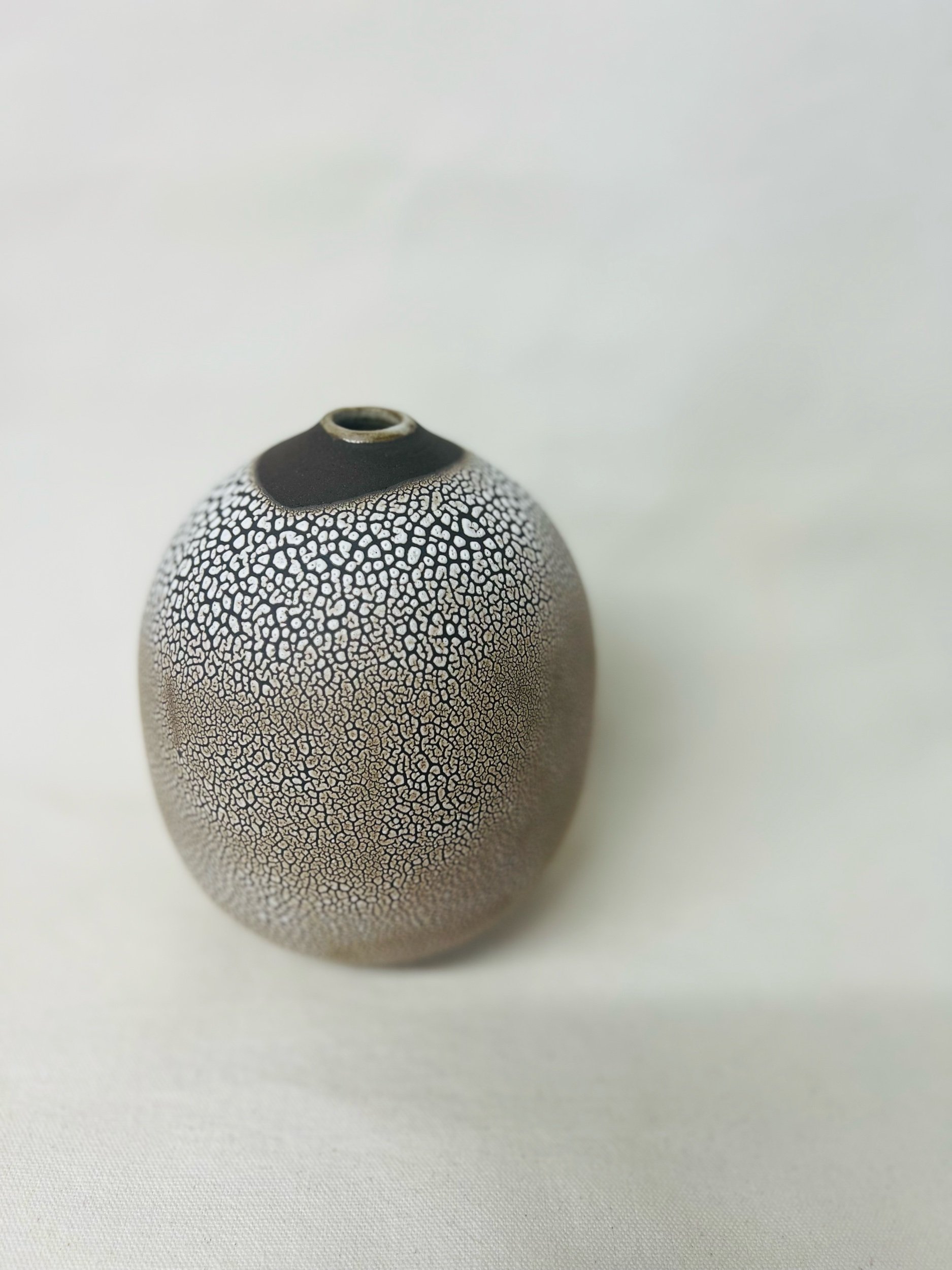 handmade ceramic vase made with black stoneware. Made in Scotland. Handmade rustic stoneware vase made in Glasgow. Home decor inspired by nature. unique handmade vases. Handmade gifts.