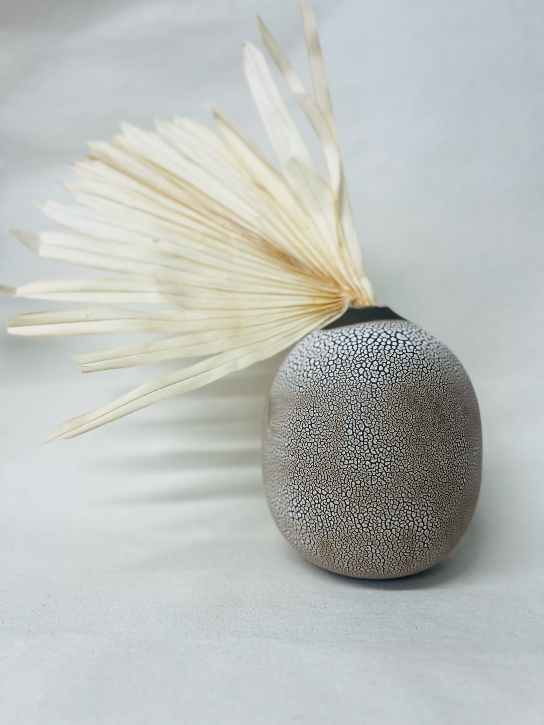 handmade ceramic vase made with black stoneware. Made in Scotland. Handmade rustic stoneware vase made in Glasgow. Home decor inspired by nature. unique handmade vases. Handmade gifts.