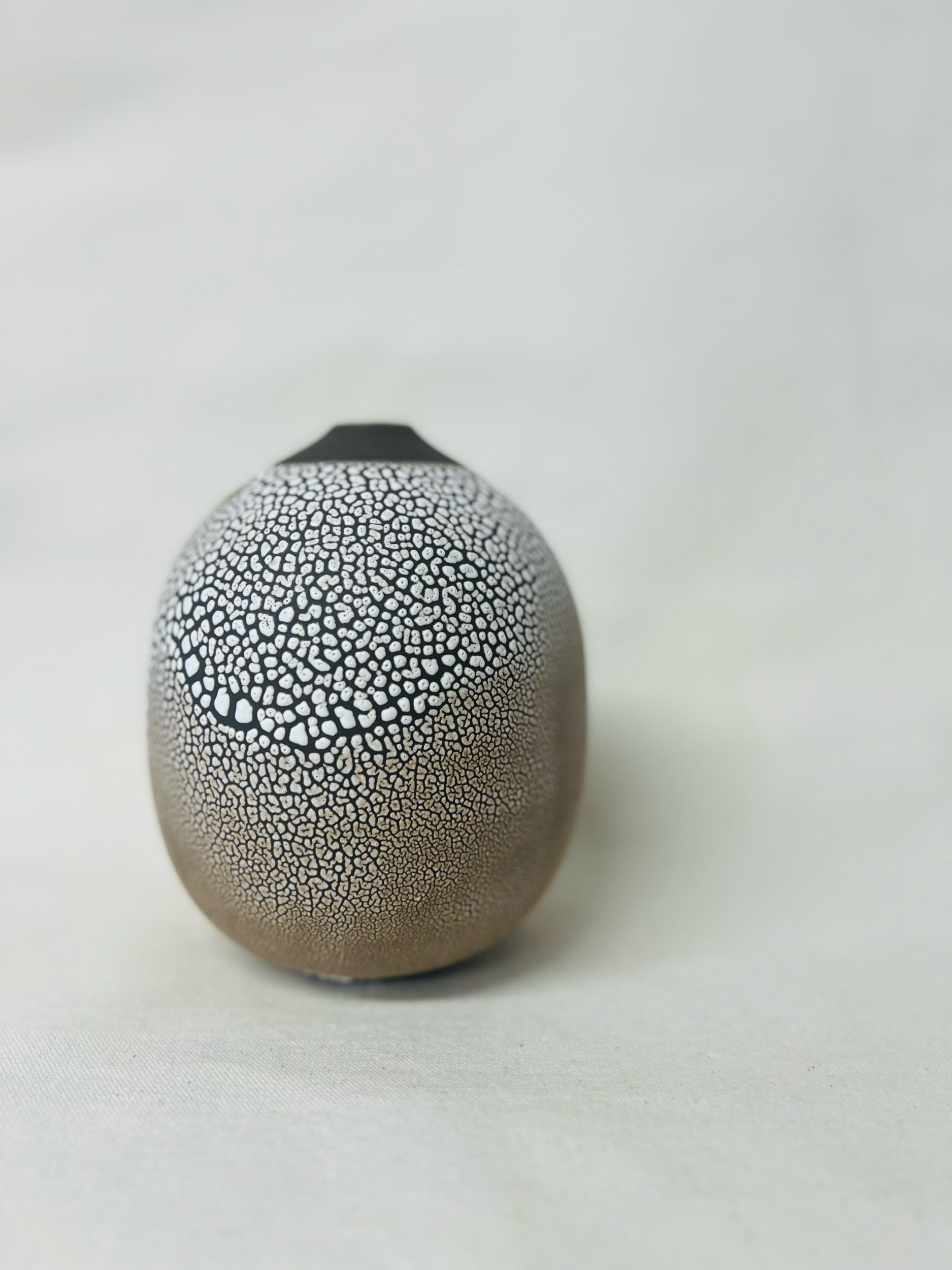 handmade ceramic vase made with black stoneware. Made in Scotland. Handmade rustic stoneware vase made in Glasgow. Home decor inspired by nature. unique handmade vases. Handmade gifts.