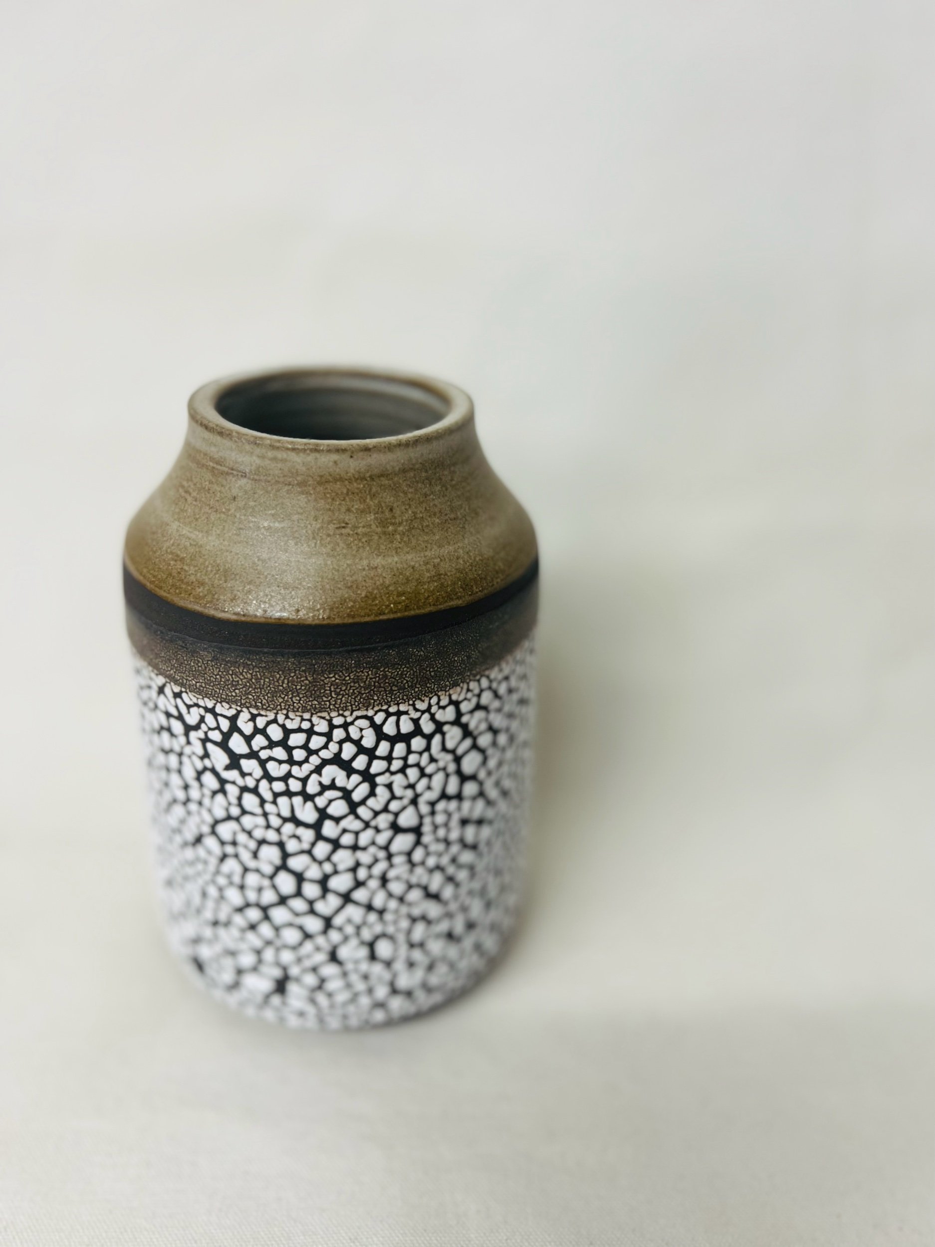 handmade ceramic vase made with black stoneware. Made in Scotland. Handmade rustic stoneware vase made in Glasgow. Home decor inspired by nature. unique handmade vases. Handmade gifts.
