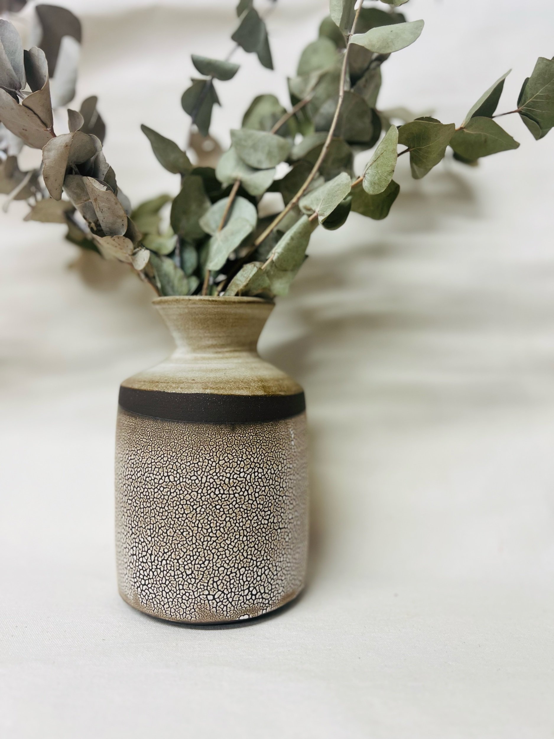 Modern rustic vase made in Scotland. Pottery handmade in Glasgow. Unique gift ideas inspired by nature. Handmade home decor.