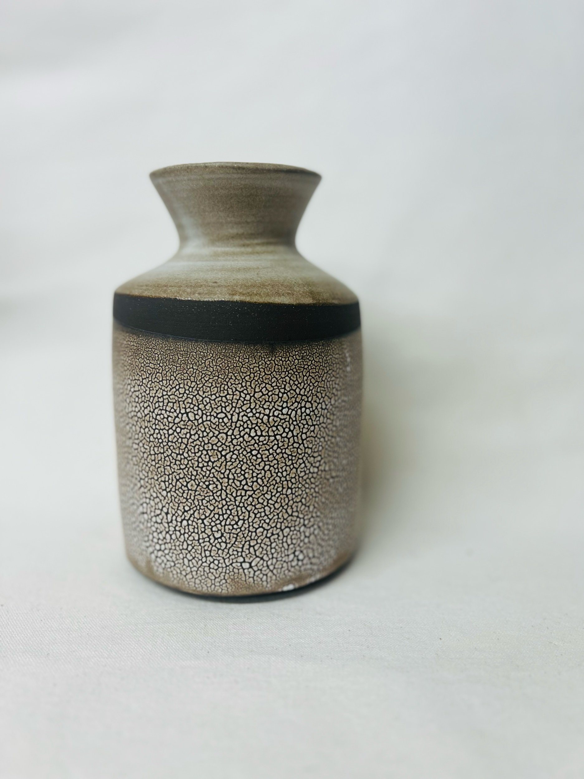 Modern rustic vase made in Scotland. Pottery handmade in Glasgow. Unique gift ideas inspired by nature. Handmade home decor.