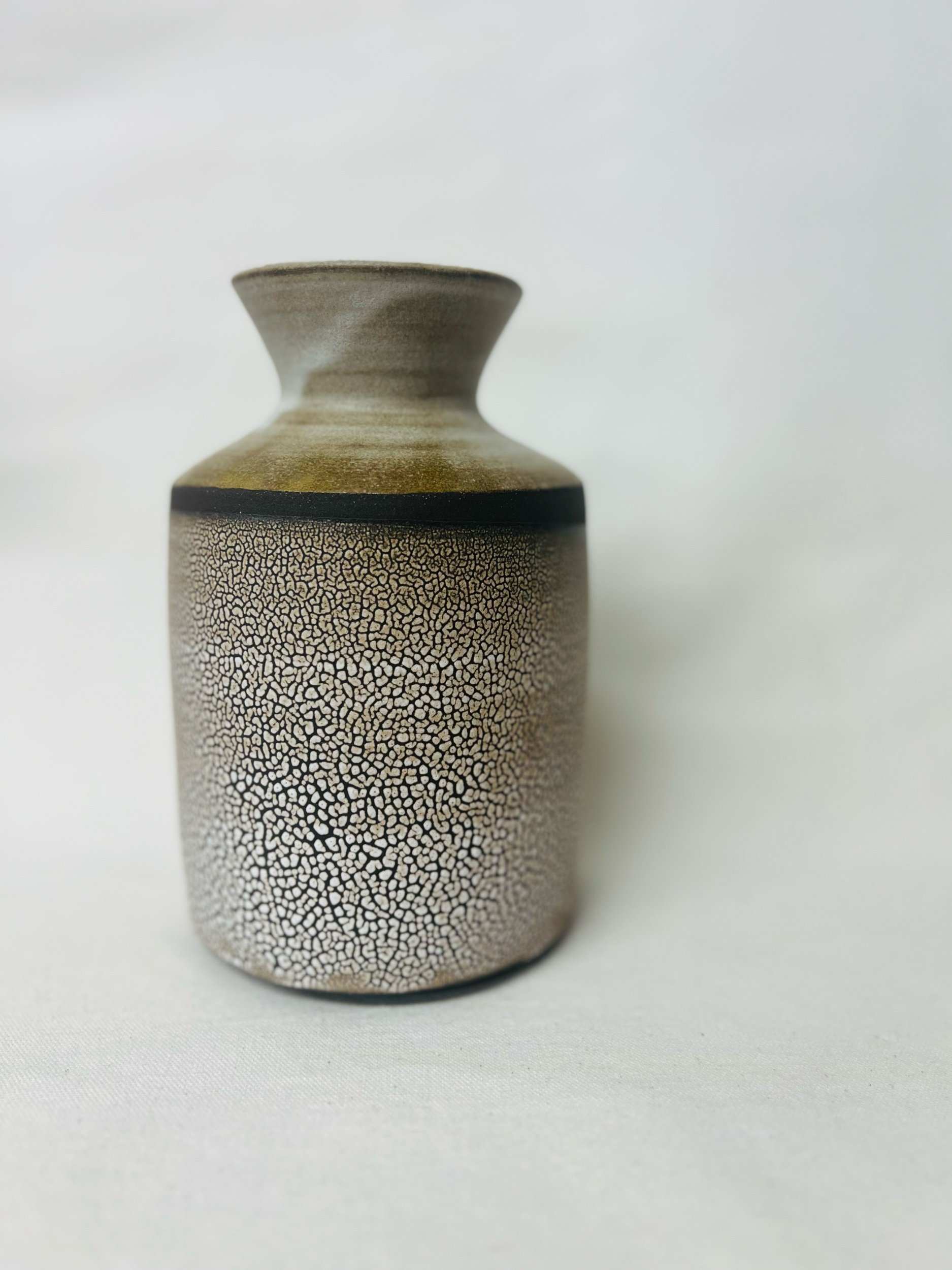 Modern rustic vase made in Scotland. Pottery handmade in Glasgow. Unique gift ideas inspired by nature. Handmade home decor.
