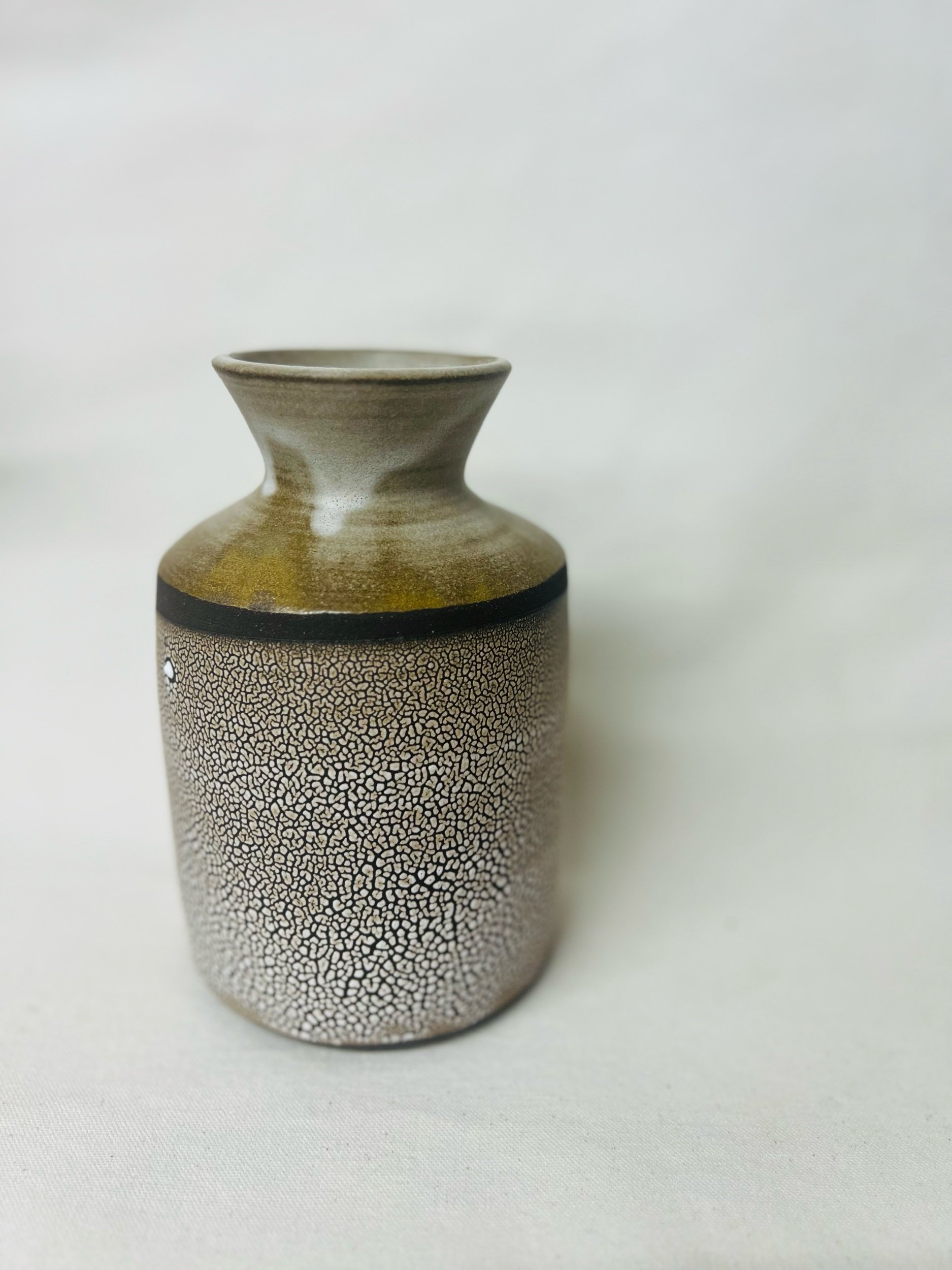 Modern rustic vase made in Scotland. Pottery handmade in Glasgow. Unique gift ideas inspired by nature. Handmade home decor.