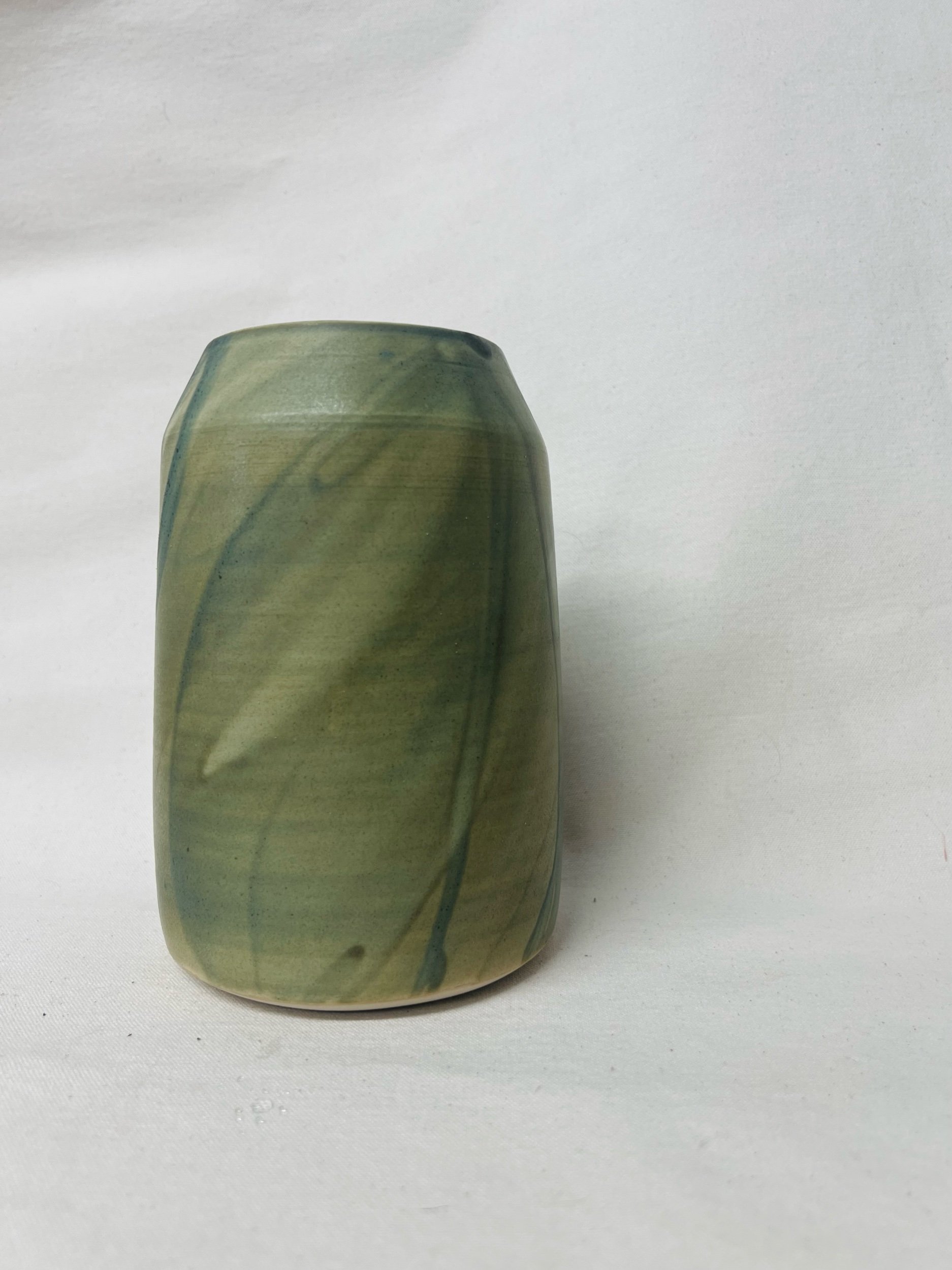 Large, handmade ceramic vase with a green glaze made in Glasgow. Crafted with white stoneware clay. Scottish home decor inspired by nature. unique handmade vases. Scottish handmade gifts.