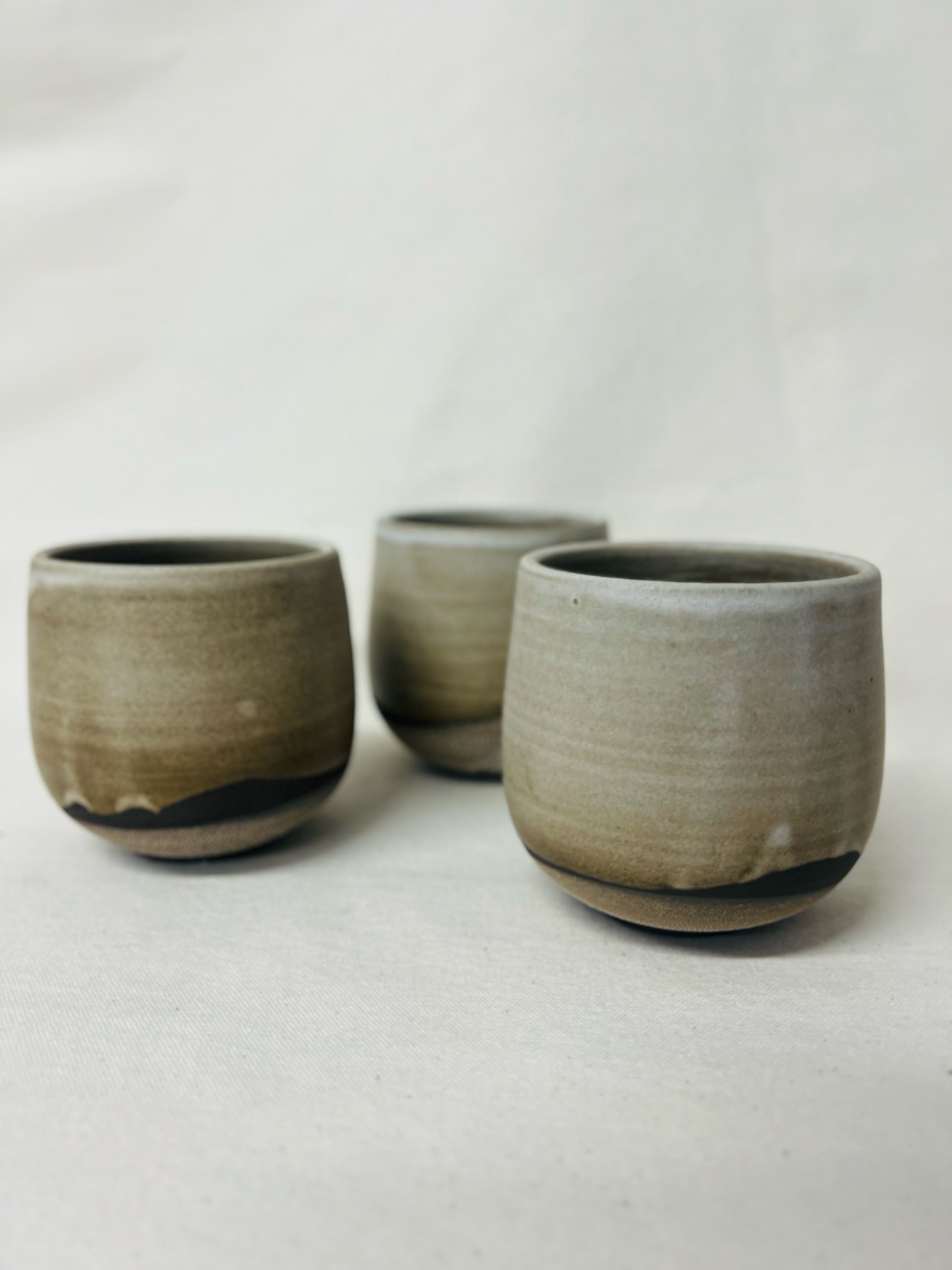 Handmade cup made in Scotland. Handmade stoneware tumbler, made in Glasgow. Handmade ceramic mug, made in Scotland.