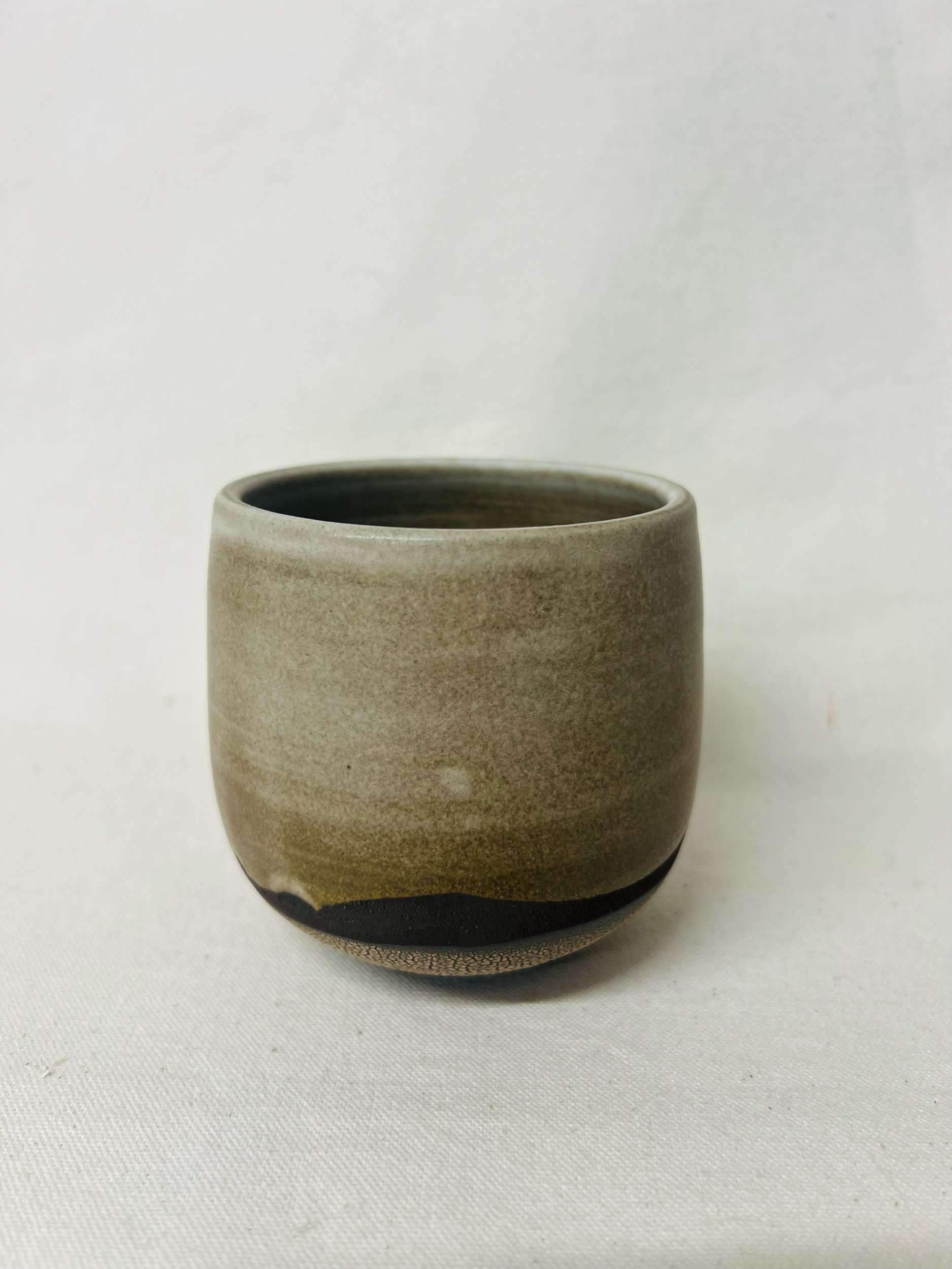 Handmade cup made in Scotland. Handmade stoneware tumbler, made in Glasgow. Handmade ceramic mug, made in Scotland.