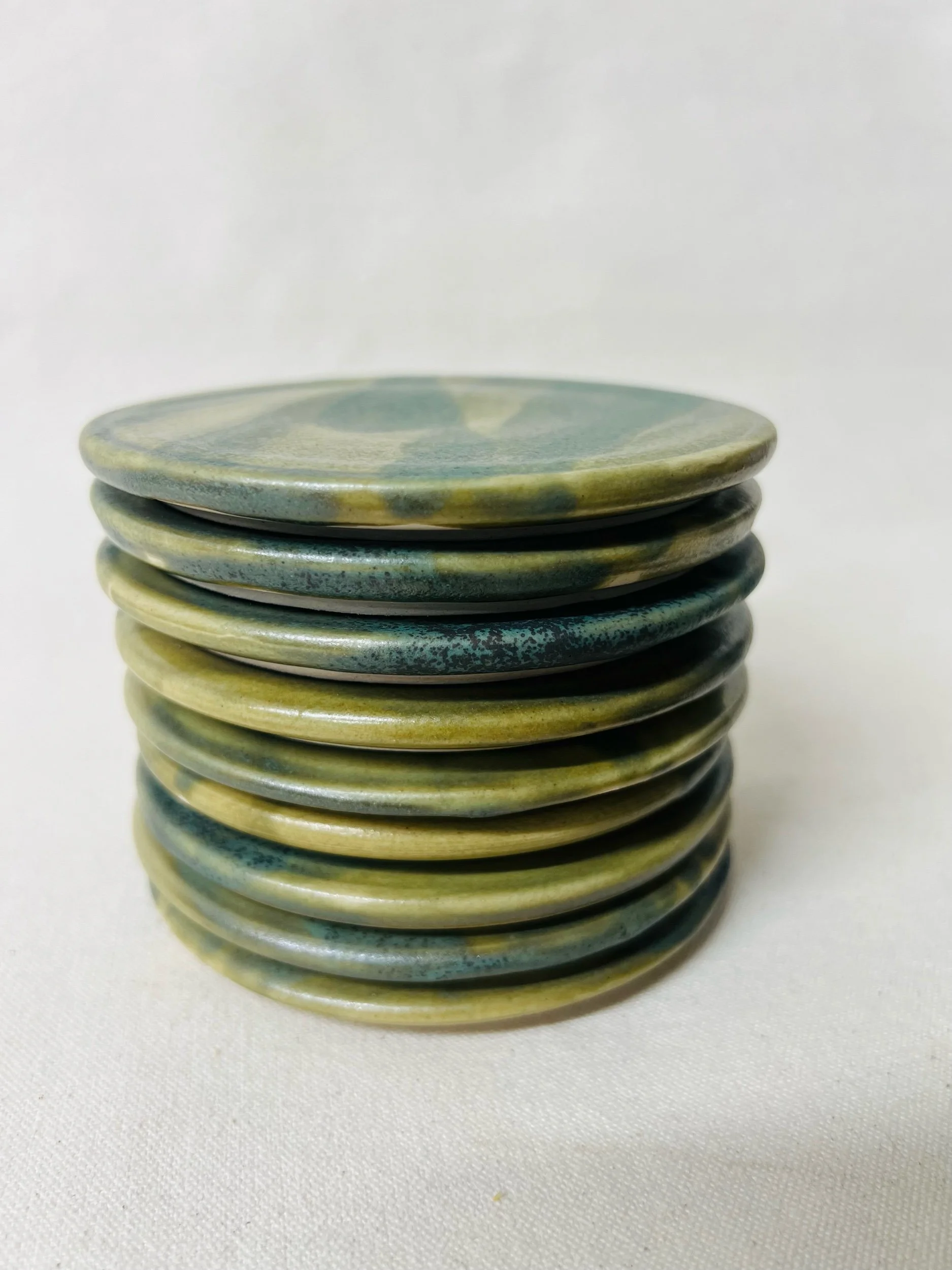 Handmade ceramic coaster, made in scotland. Pottery designed by nature.