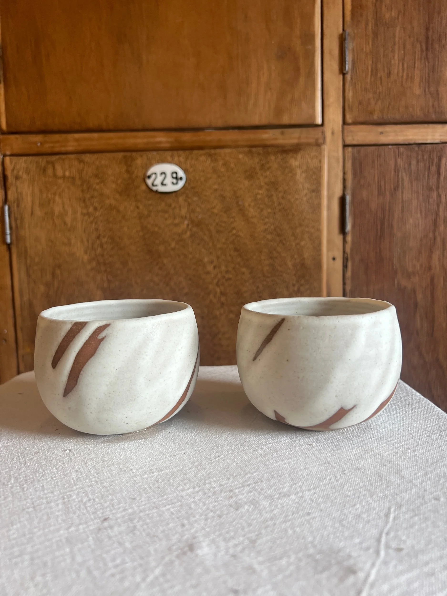 Handmade ceramic tumbler made with buff stoneware. From the Birch collection.