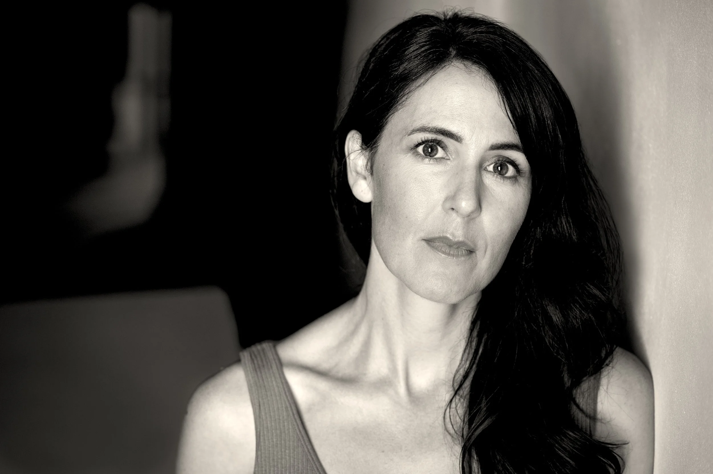 black and white headshot photo of Hilary Fair