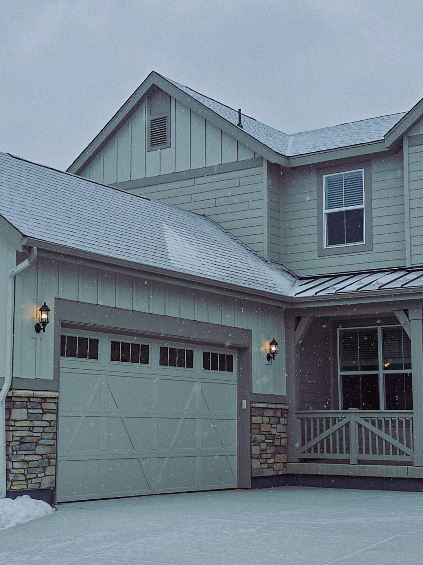 A home in Colorado's Winter, a light layer of snow and ice is building on the roof of the building and driveway. An inspection is taking place to make sure this roof is ready for winter.