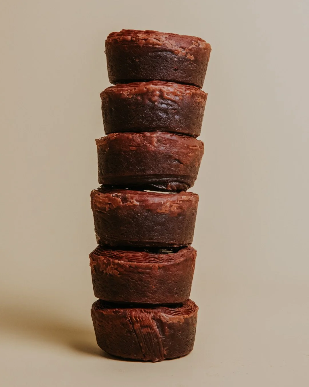 A bite sized study in indulgence.⁠
⁠
Chocolate croissant shell, soft velvety flan, luscious ganache, a glossy chocolate glaze, and a gold leaf. ⁠
⁠
Small in size, big on taste our chocolate delight is the perfect sweet treat. Duck in 7AM - 4PM 💛⁠
⁠
