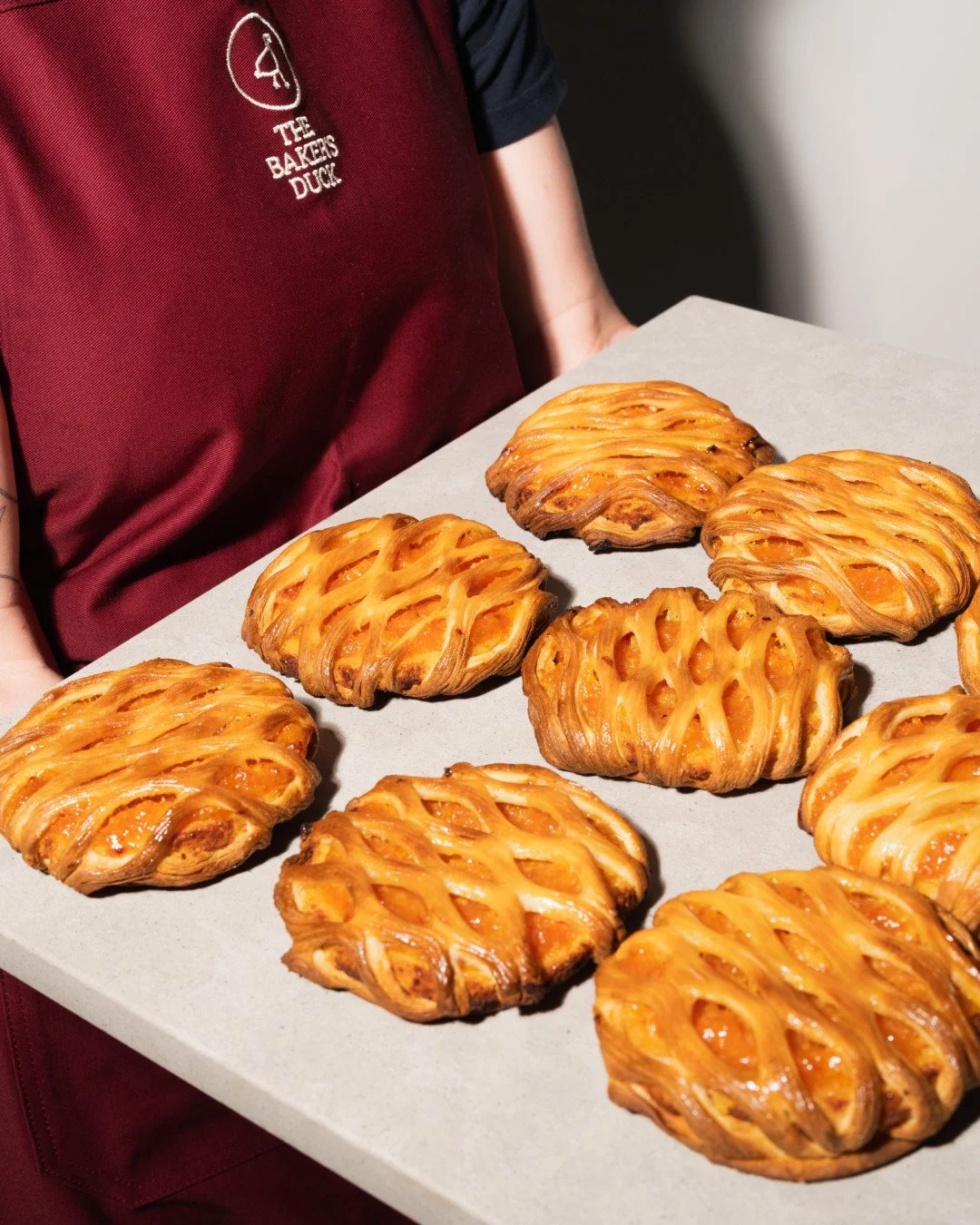 A little sunshine wrapped in pastry. ✨⁠
⁠
The Citrus Lattice Cookie layers delicate croissant pastry with Sakura and grapefruit Jaconde, a zesty citrus marmalade, and buttery shortcrust. It's finished with a clear glaze for that golden spring glow. ⁠